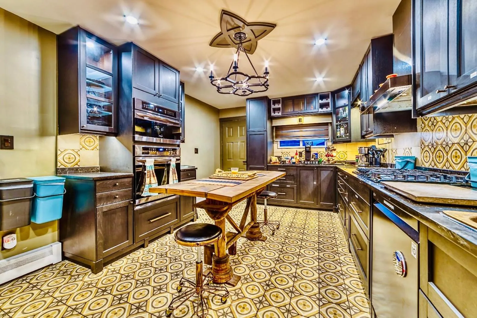 Communal kitchen in Neocolonial Nouveau Kensington Vacation Home