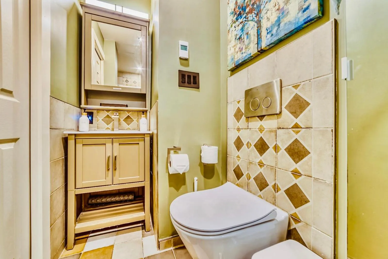 Toilet in Neocolonial Nouveau Kensington Vacation Home