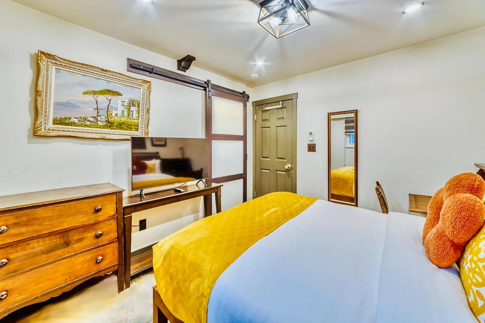 Bed in Neocolonial Nouveau Kensington Vacation Home