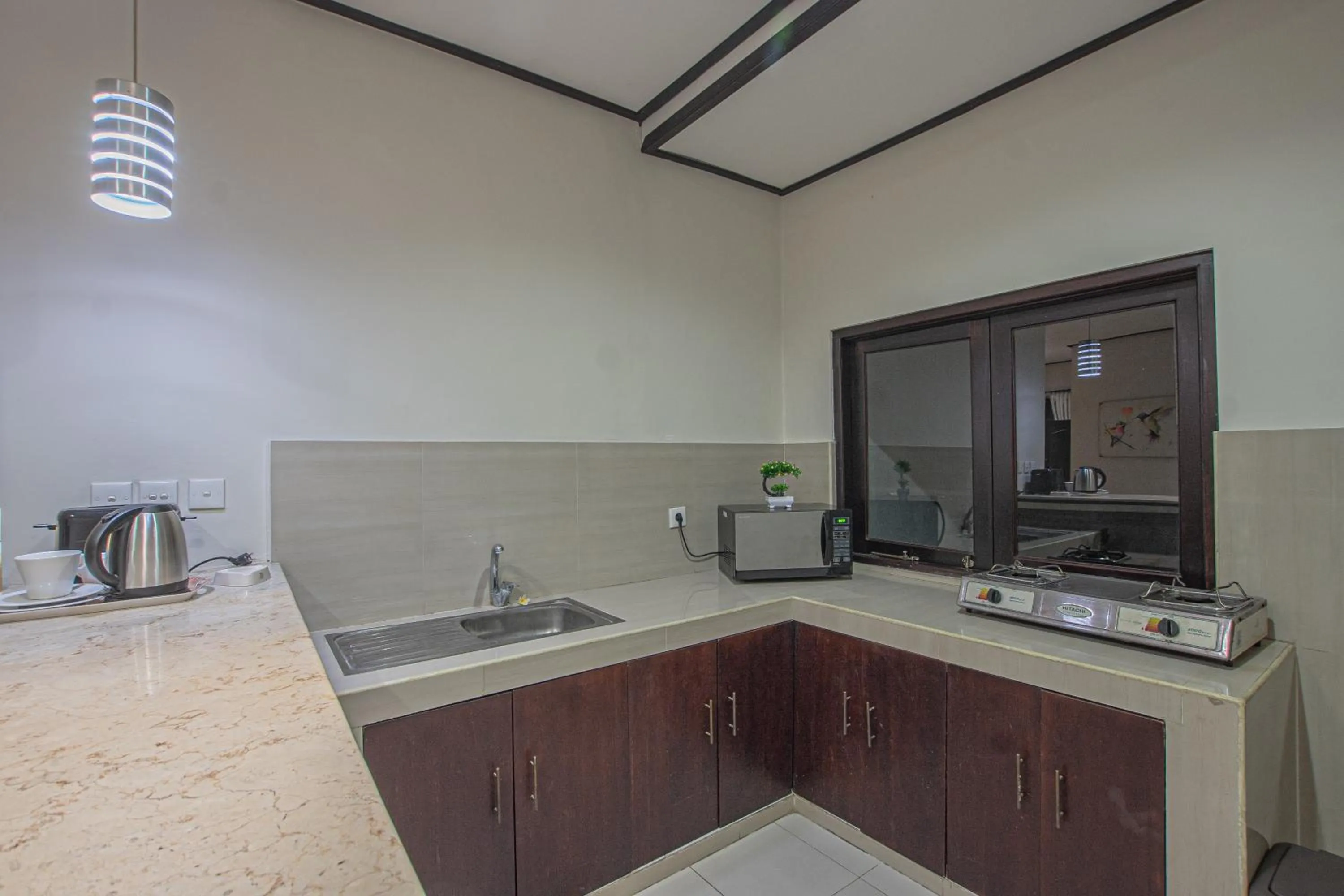 Kitchen or kitchenette in Panorama Cottages I