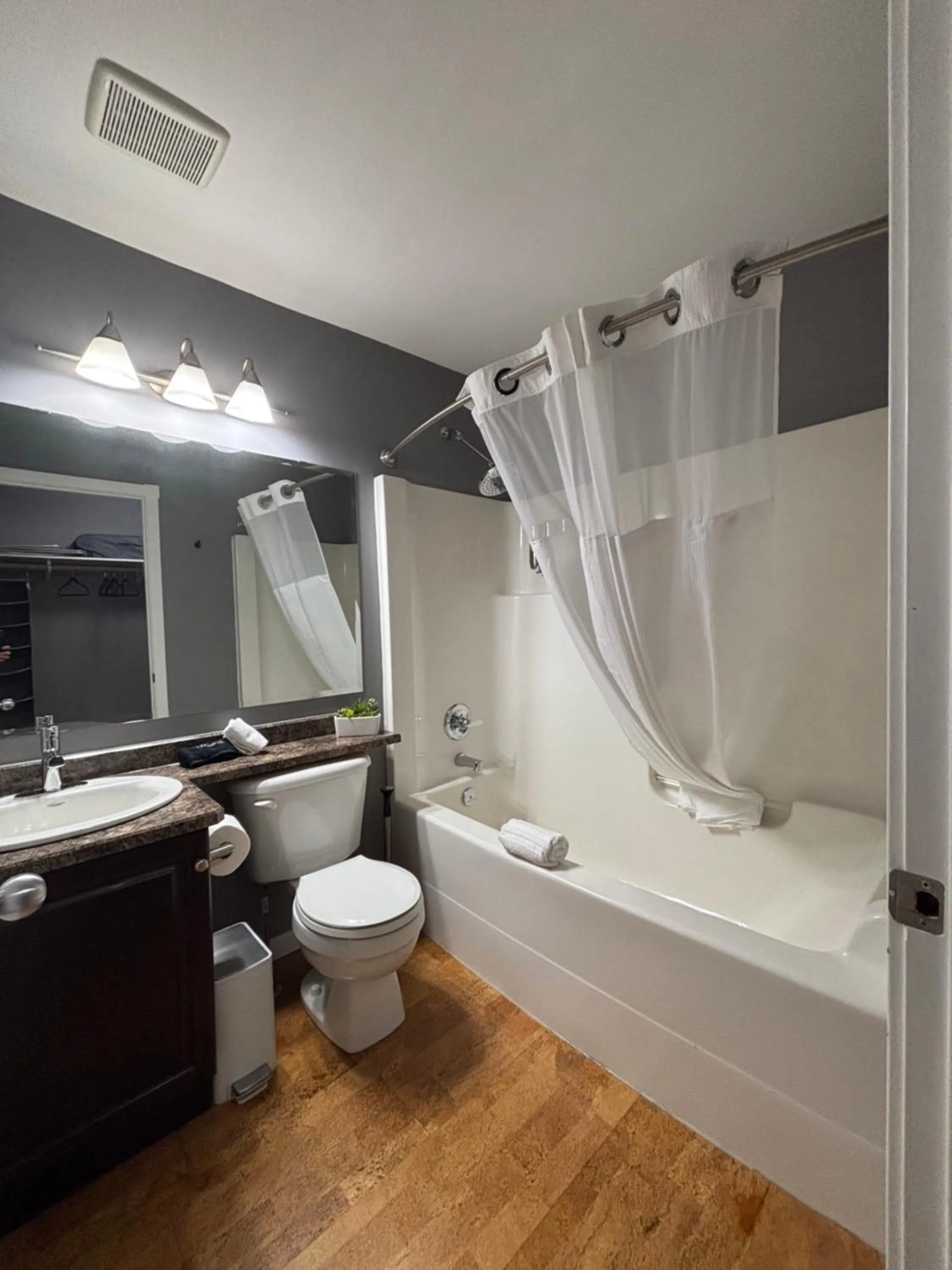 Bathroom in Top Floor Riverfront Condo with Stellar Sunsets!