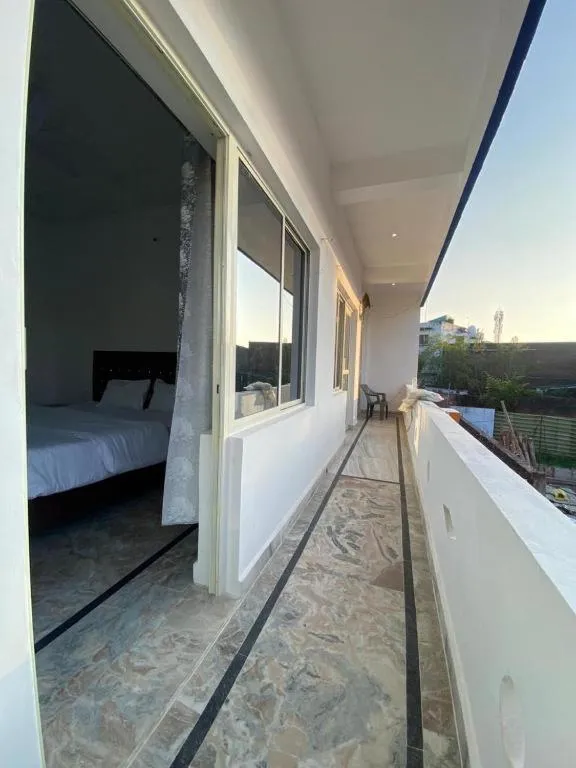 Triple Room with Balcony in Karma Hostel
