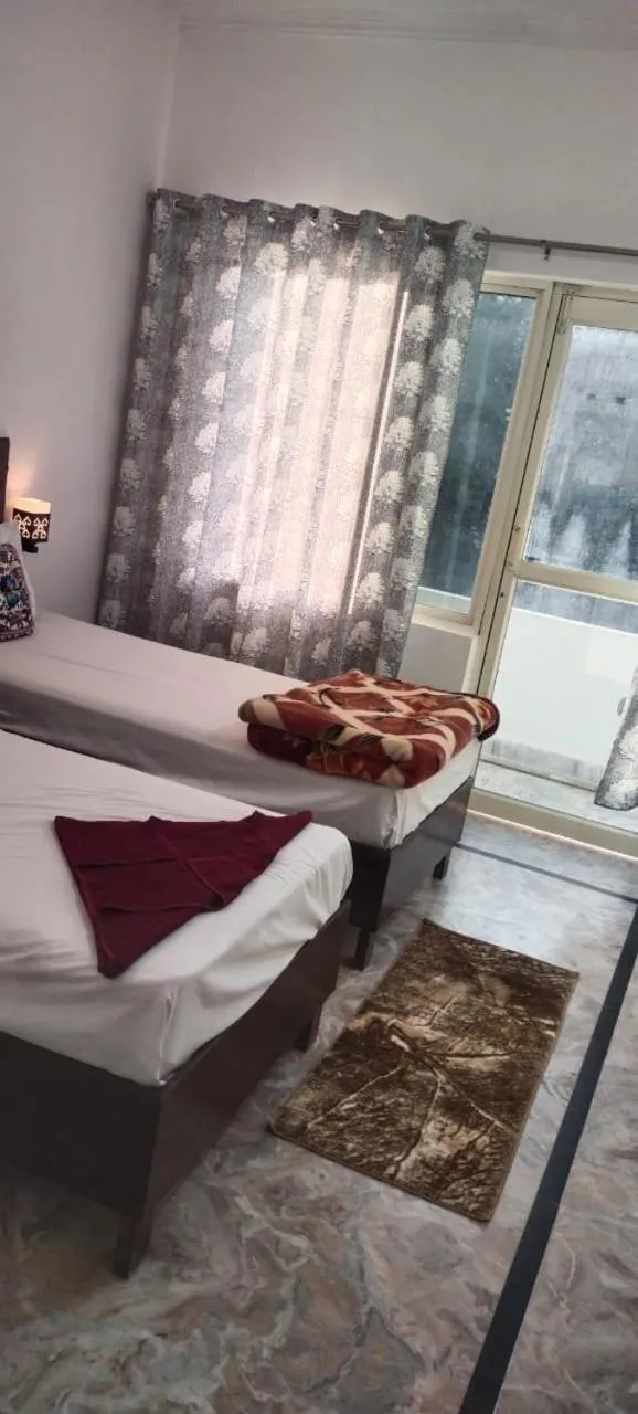 Deluxe Single Room with Balcony - single occupancy in Karma Hostel