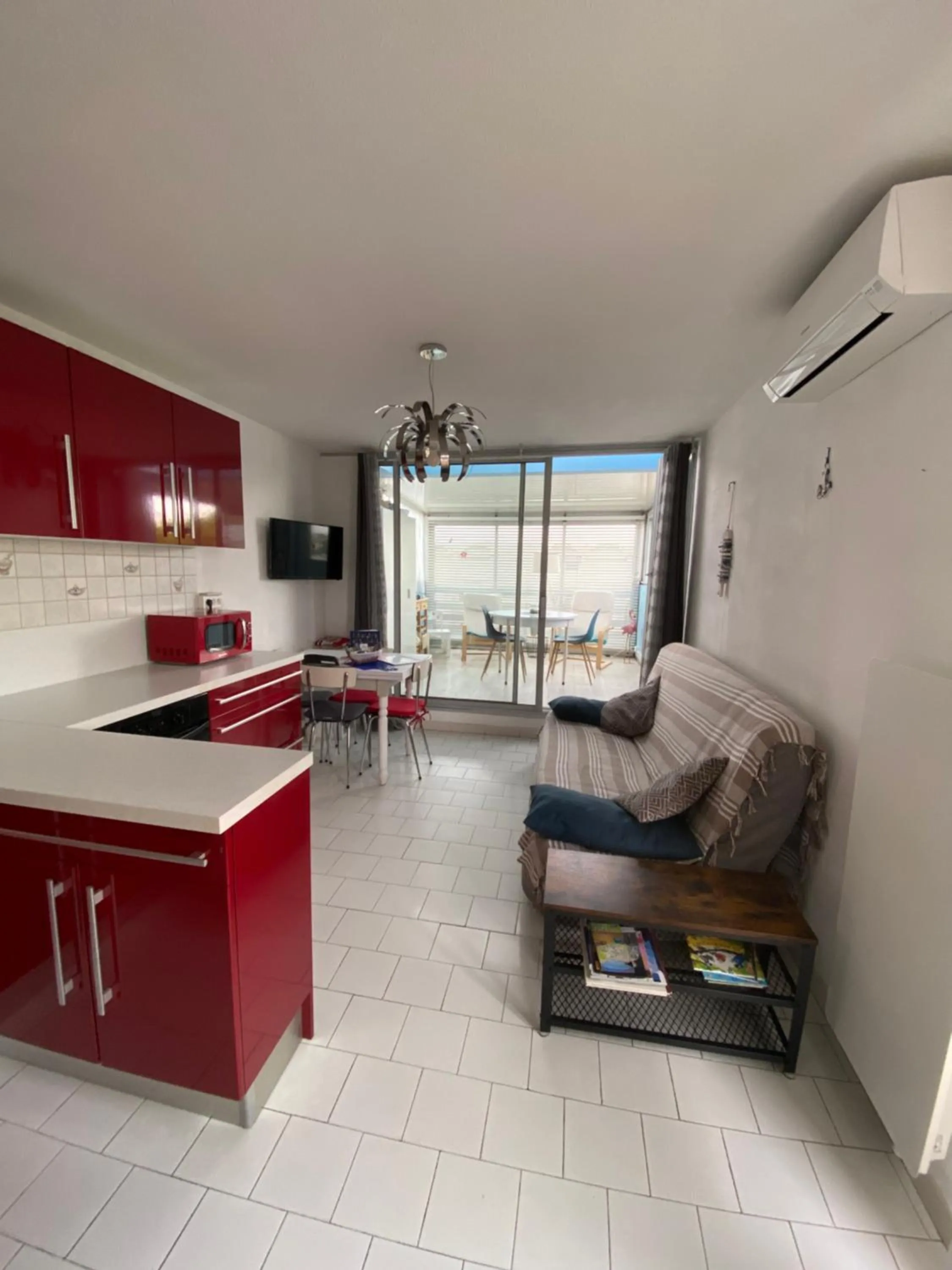 Kitchen or kitchenette in Appartement grande terrasse Climatisé