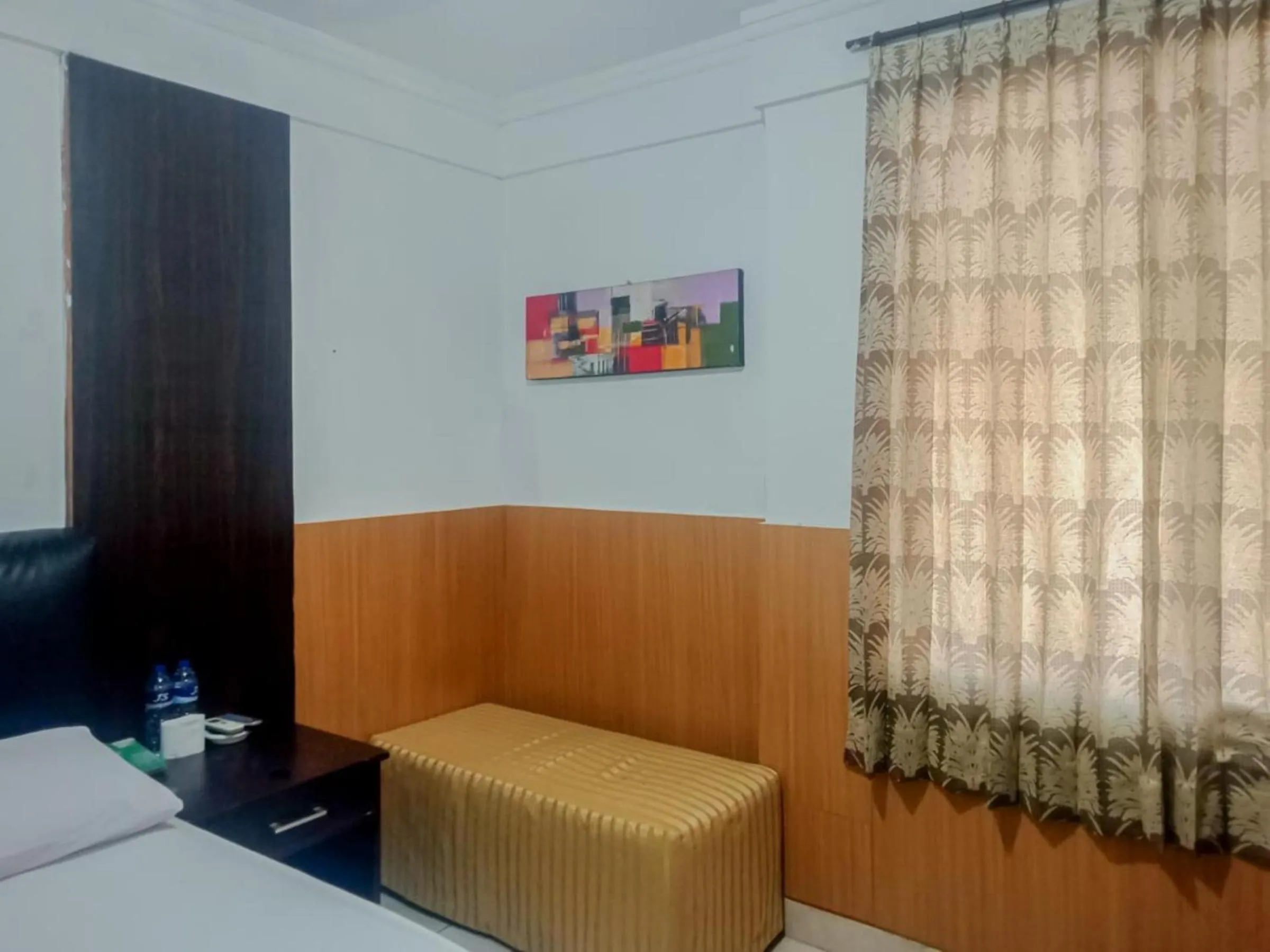 Seating area, Bed in Homestay Akik Hijau Near Panakkukang