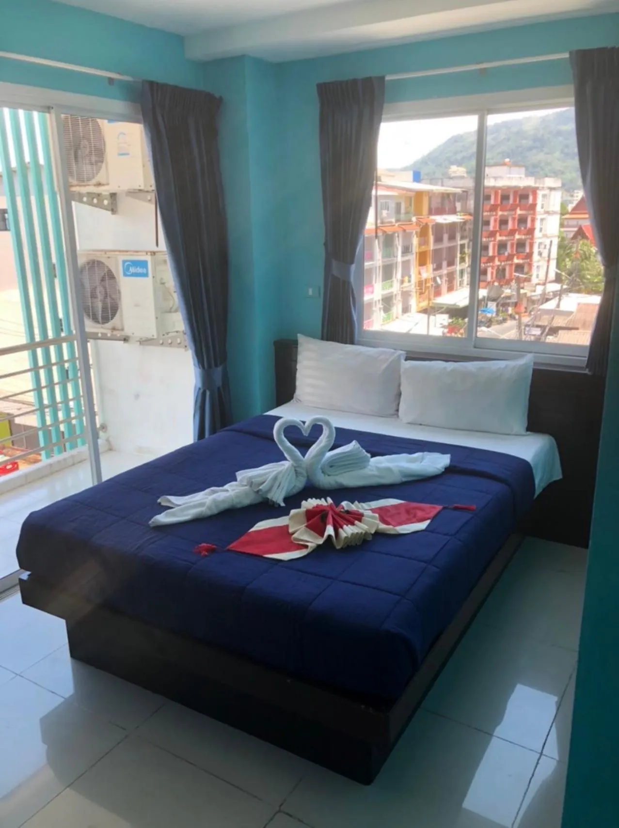 Bed in PATONG BLUE HOTEL