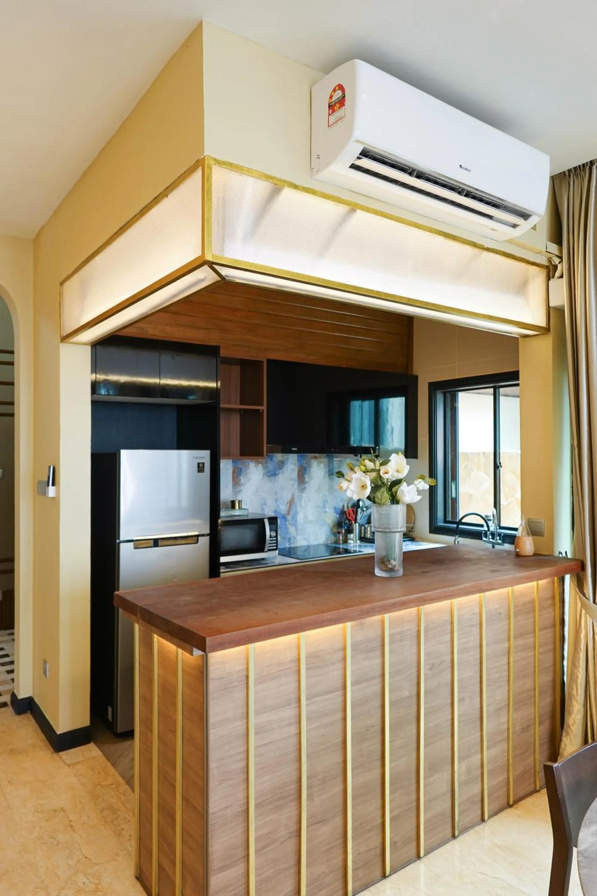 Kitchen or kitchenette in Bonheur at Karambunai