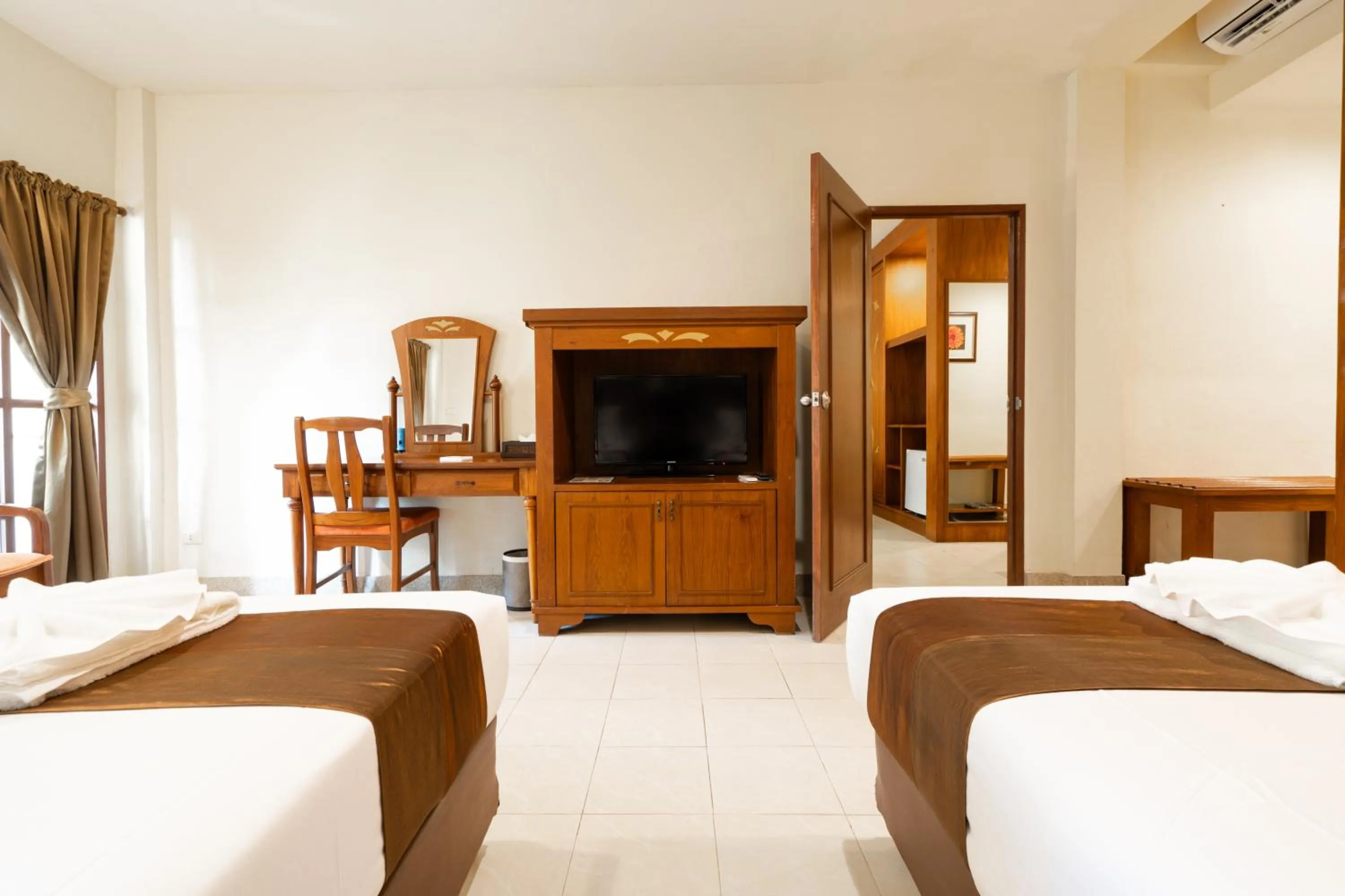 Bed in Phuket Leelavadee Hua Ting Resort