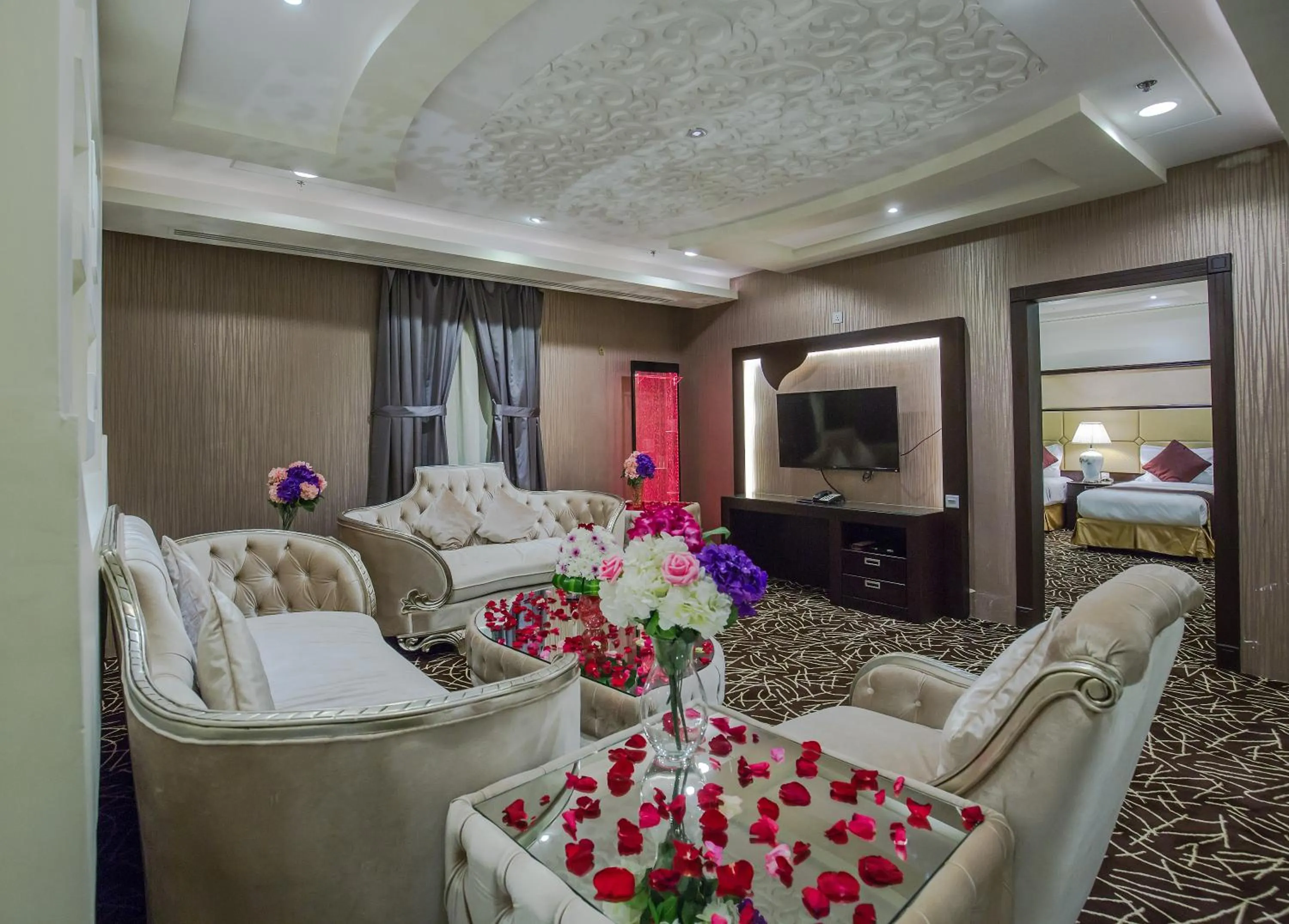 Living room, Bed in Rest Night Serviced Apartments- AlHamra