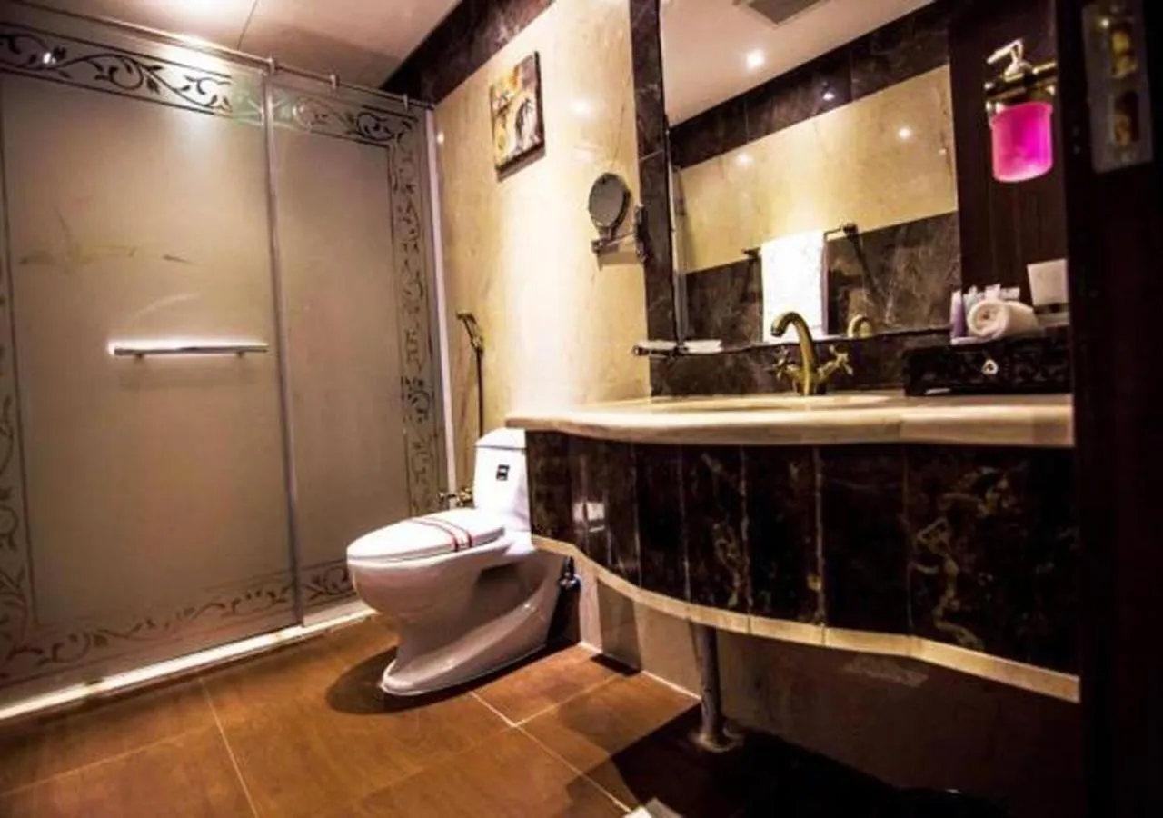 Toilet in Rest Night Serviced Apartments- AlHamra