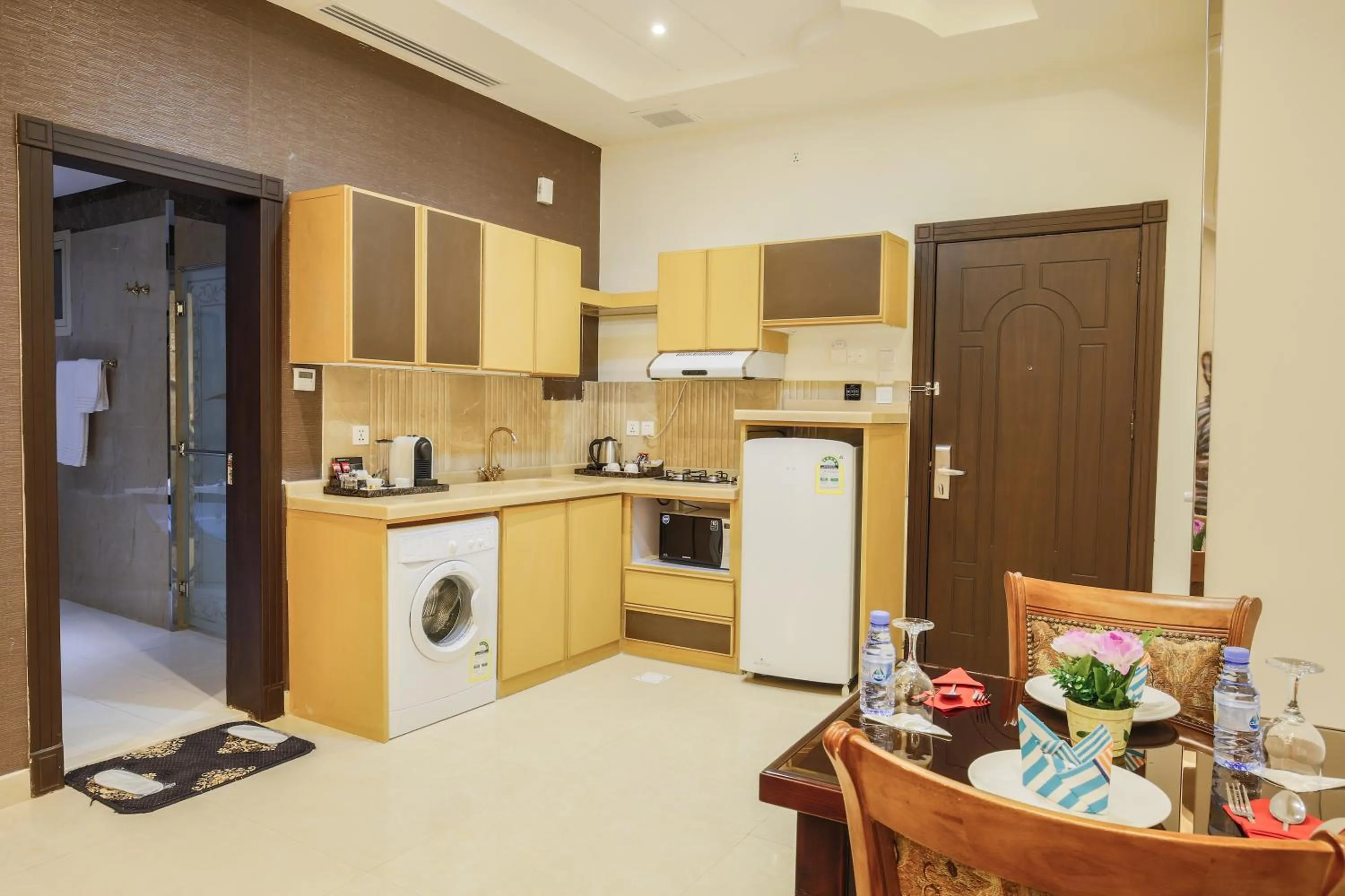 Kitchen or kitchenette in Rest Night Serviced Apartments- AlHamra