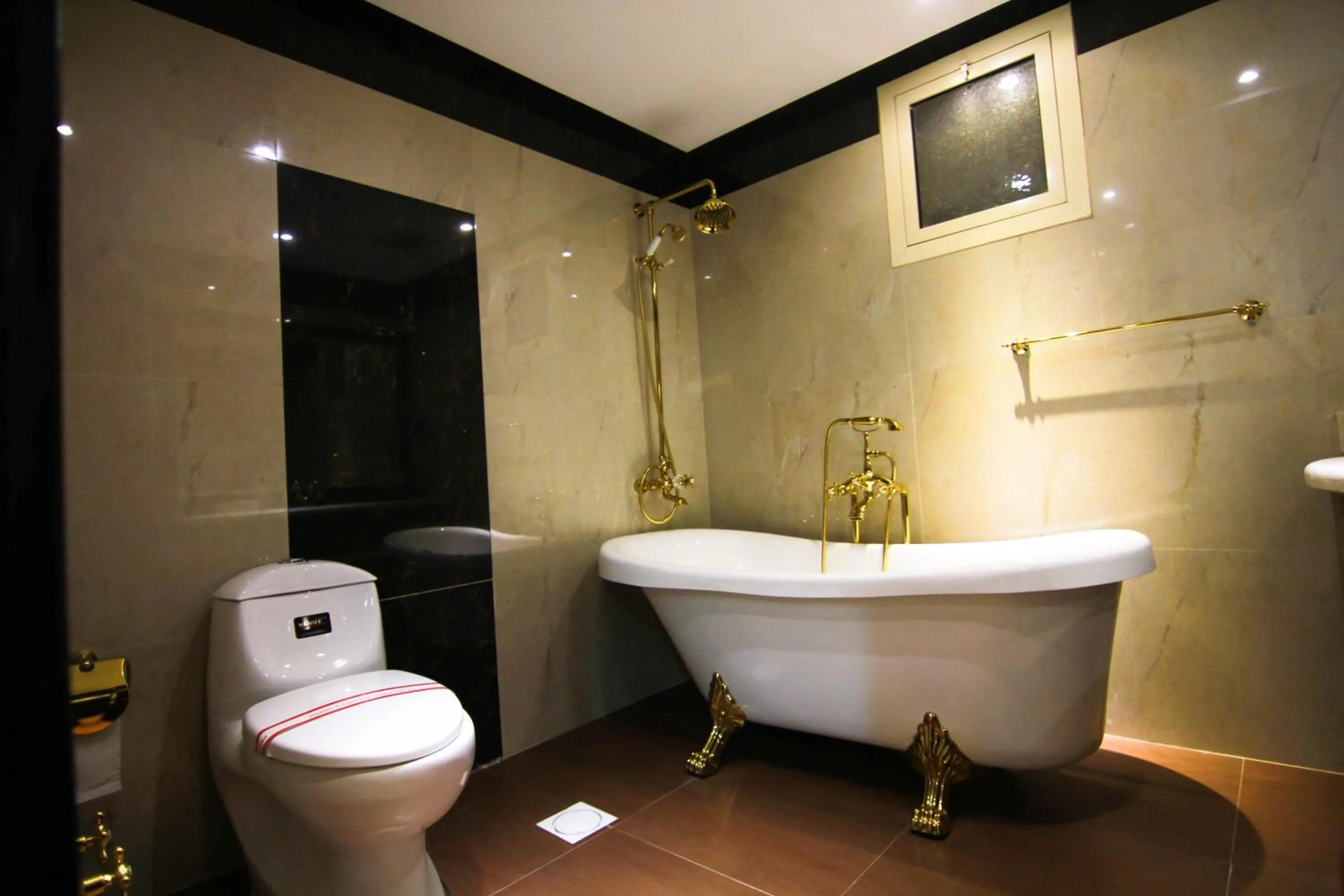 Bathroom in Rest Night Serviced Apartments- AlHamra
