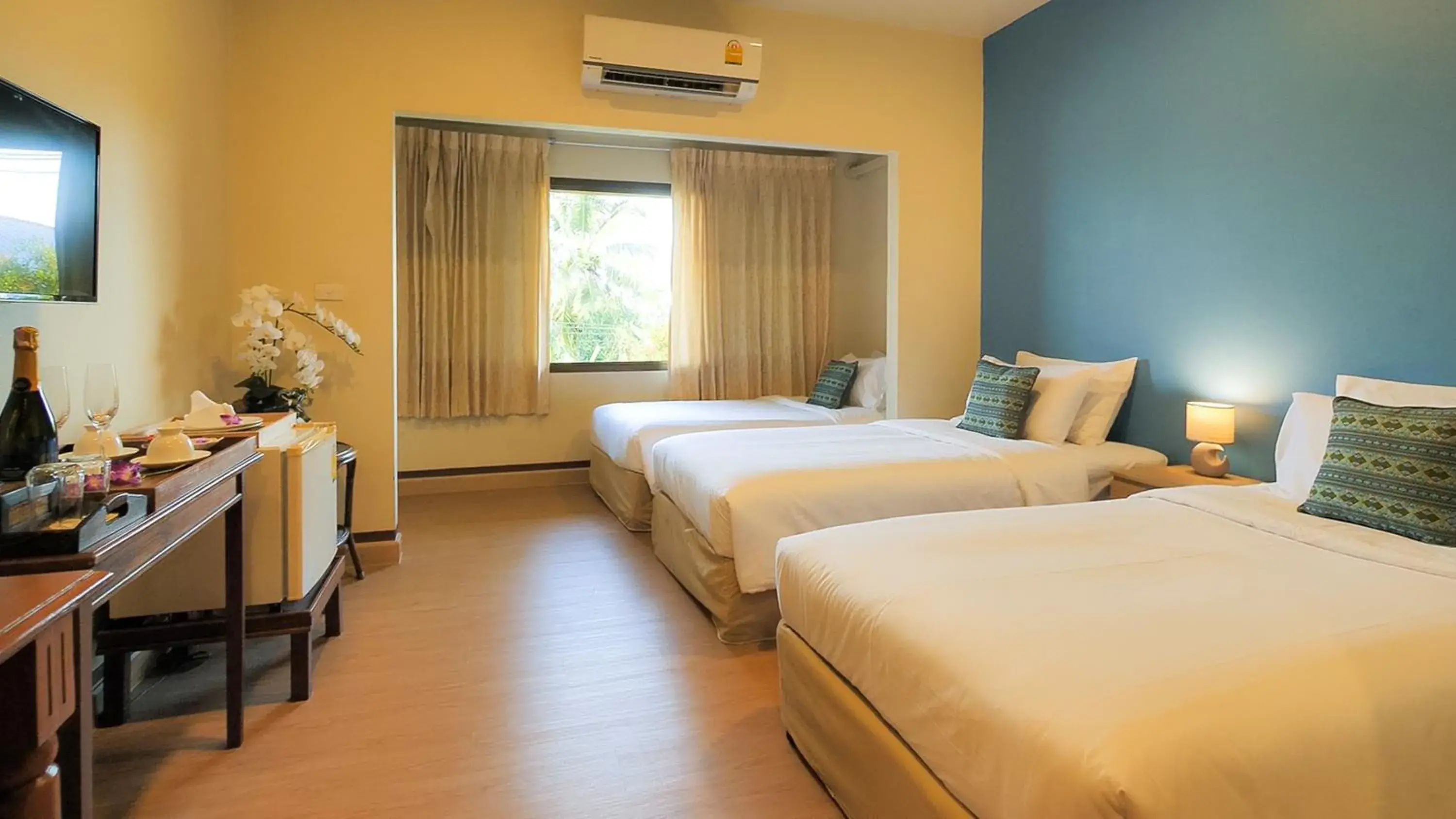 Deluxe Triple Room in Siam Avari Hotel, Chiang Rai Deluxe Triple Room in Siam Avari Hotel, Chiang Rai