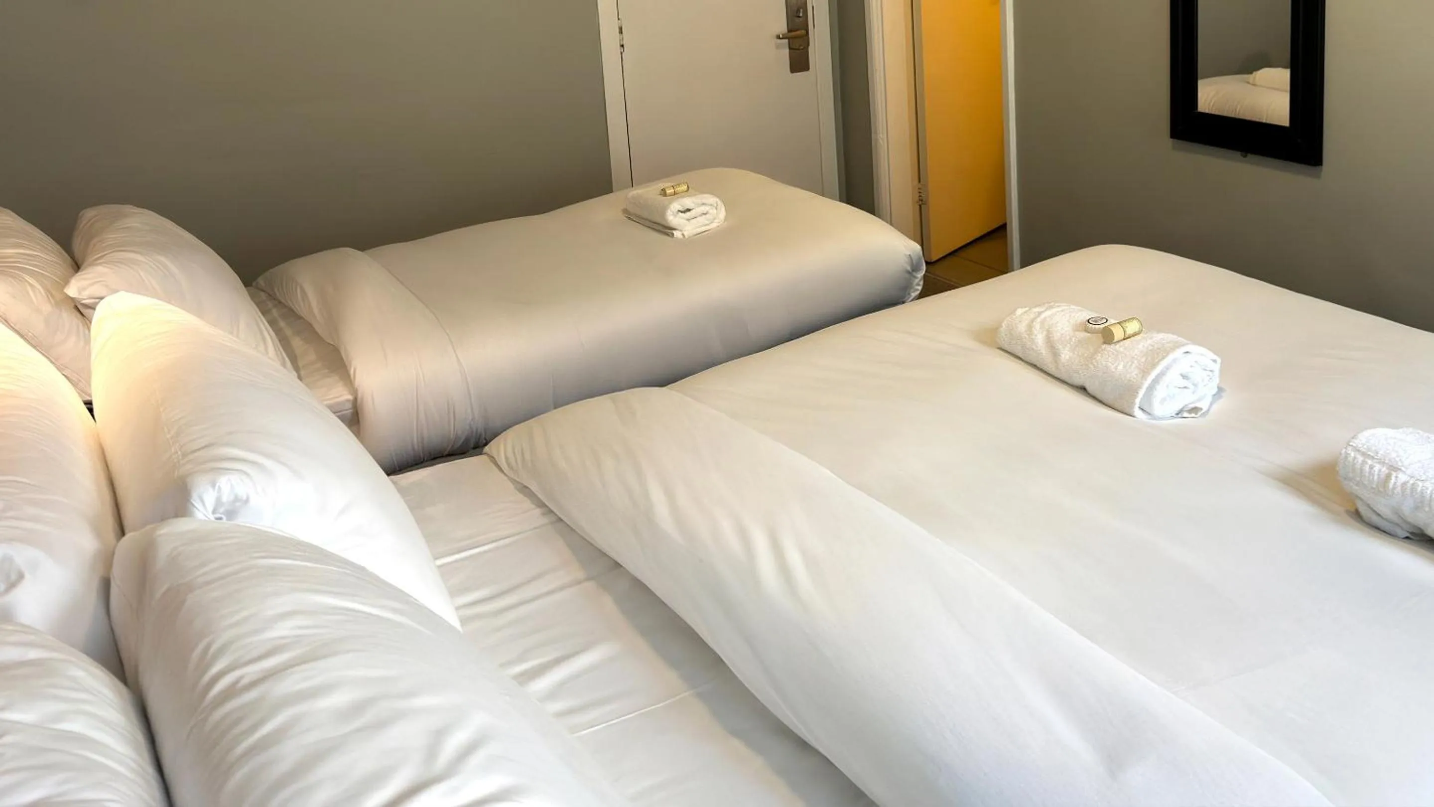 Bed in Lord Nelson Hotel by Compass Hospitality