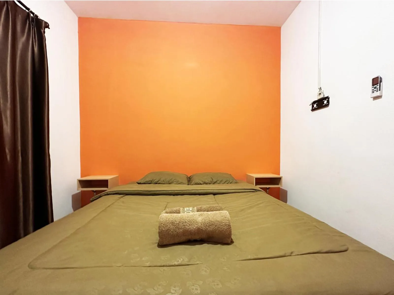 Bed in OYO 1608 Feby Maisonatte