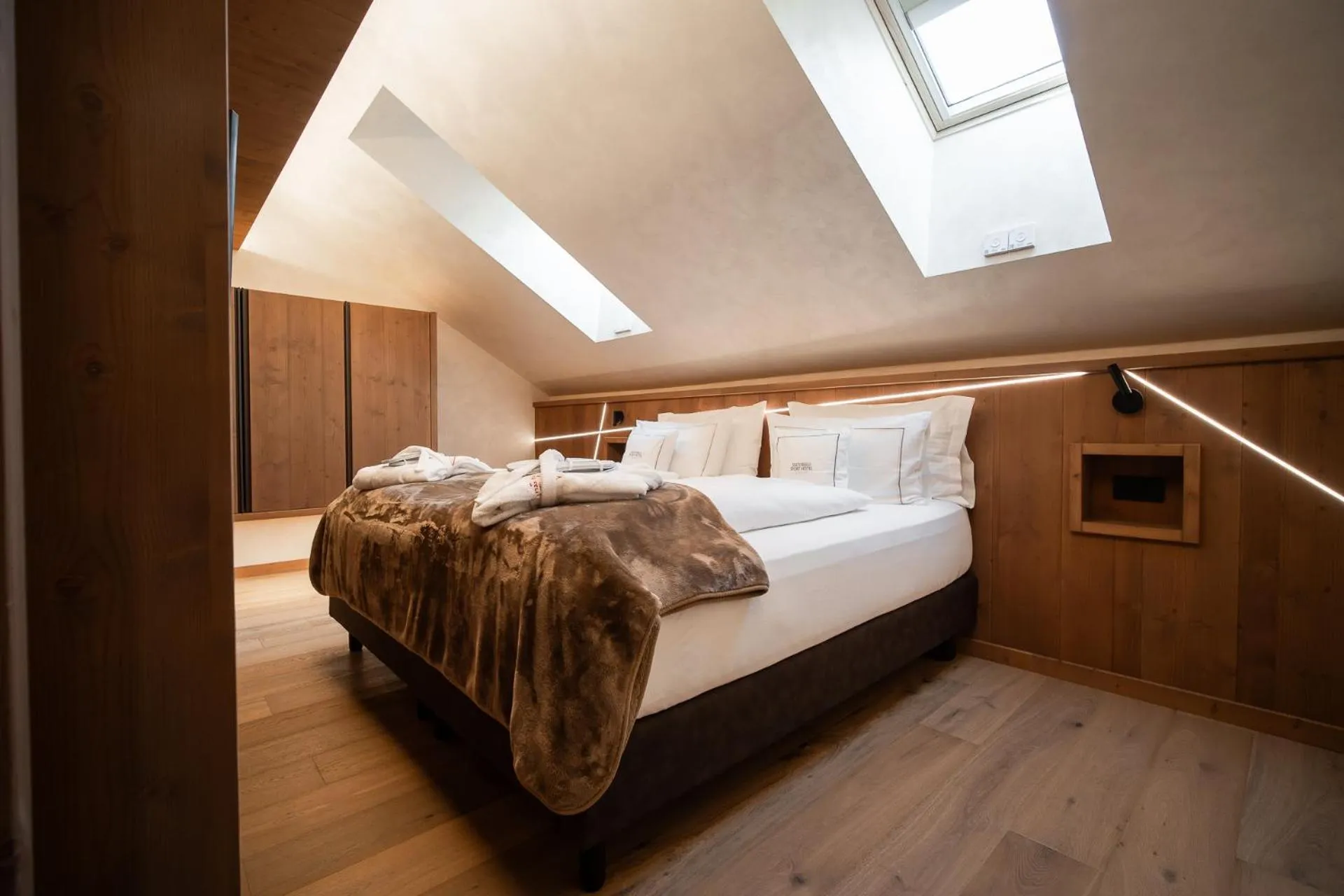 Bed in Sertorelli Sporthotel