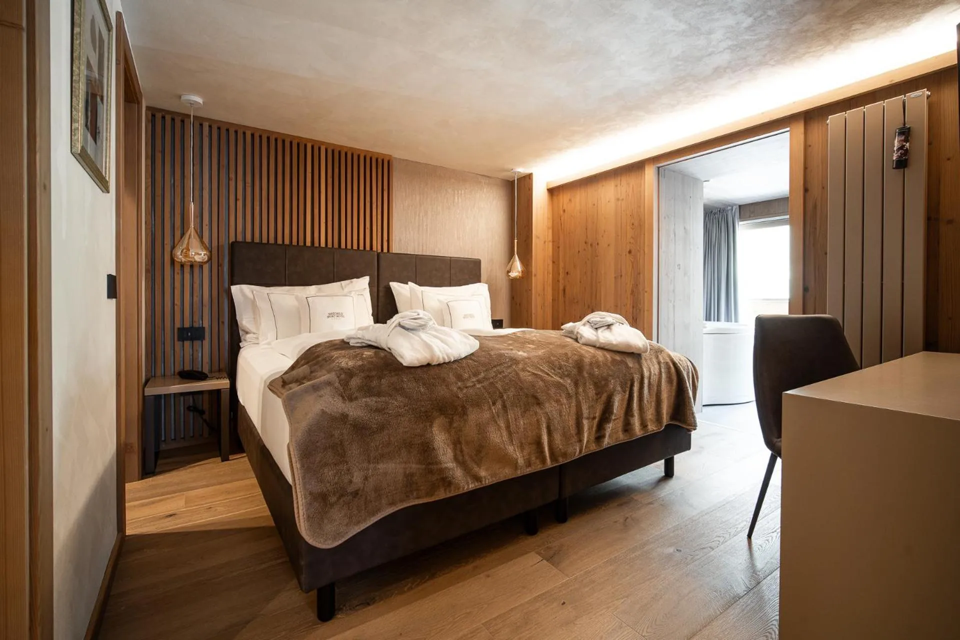 Bed in Sertorelli Sporthotel