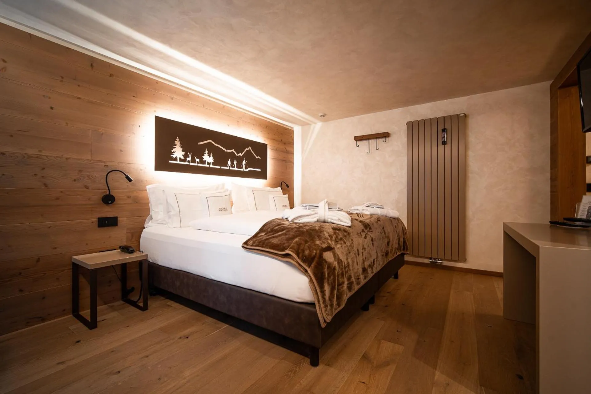 Bed in Sertorelli Sporthotel