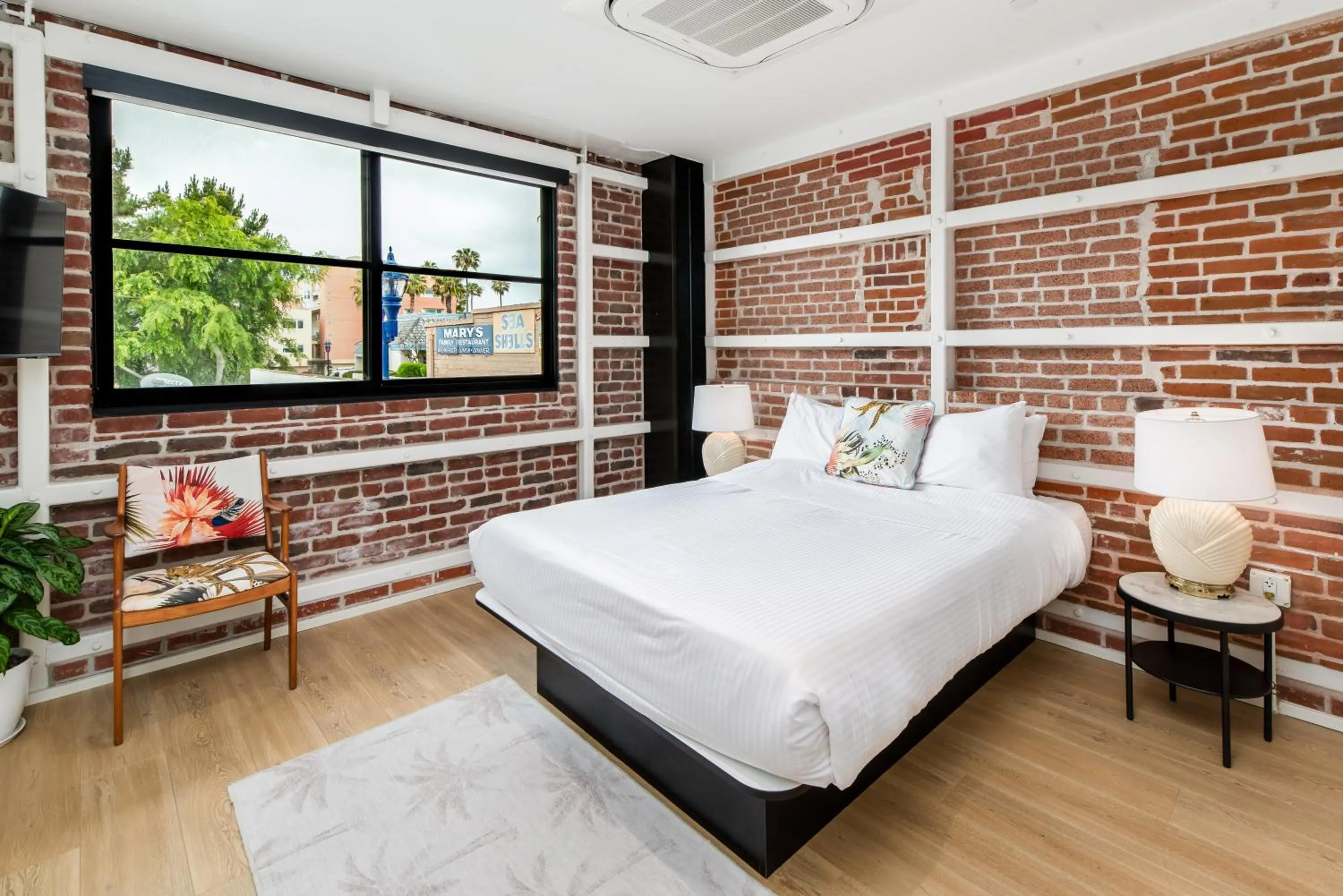 Bed in The Brick Boutique Hotel