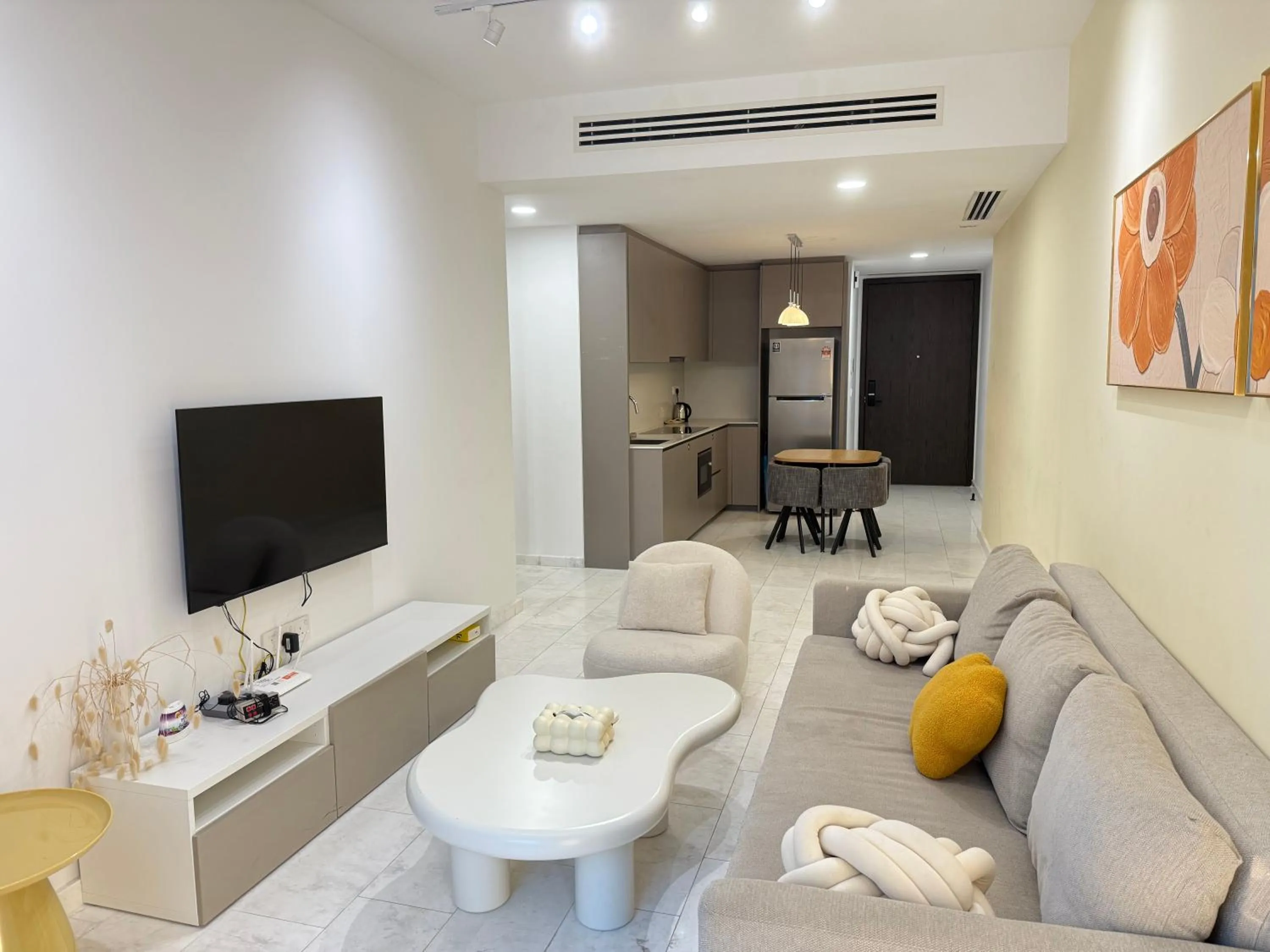 Communal lounge/ TV room in Eaton Residence KLCC By Flixses