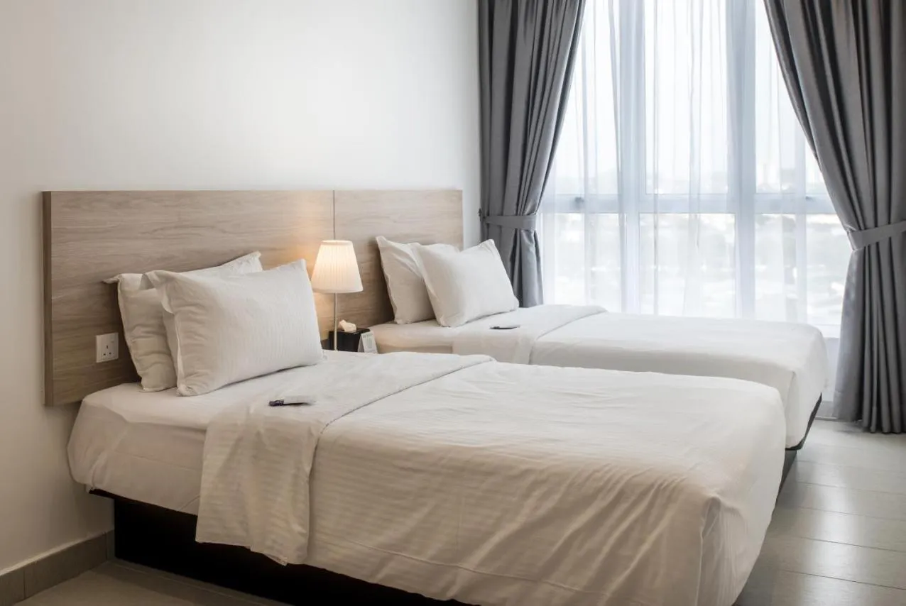 Bed in The Signature Serviced Suites & Office Puchong