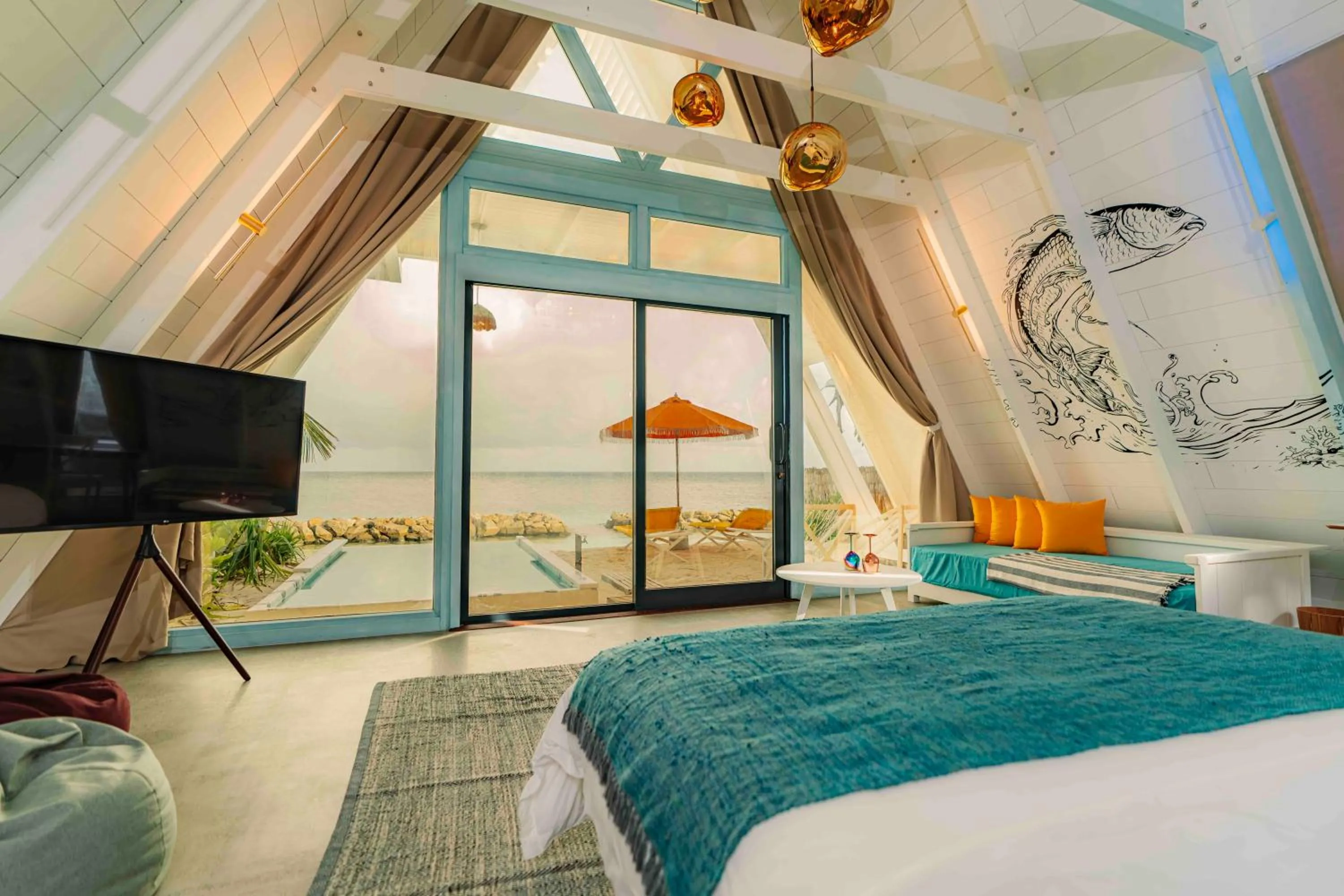 Seating area, Bed in Oaga Art Resort Maldives - All Inclusive