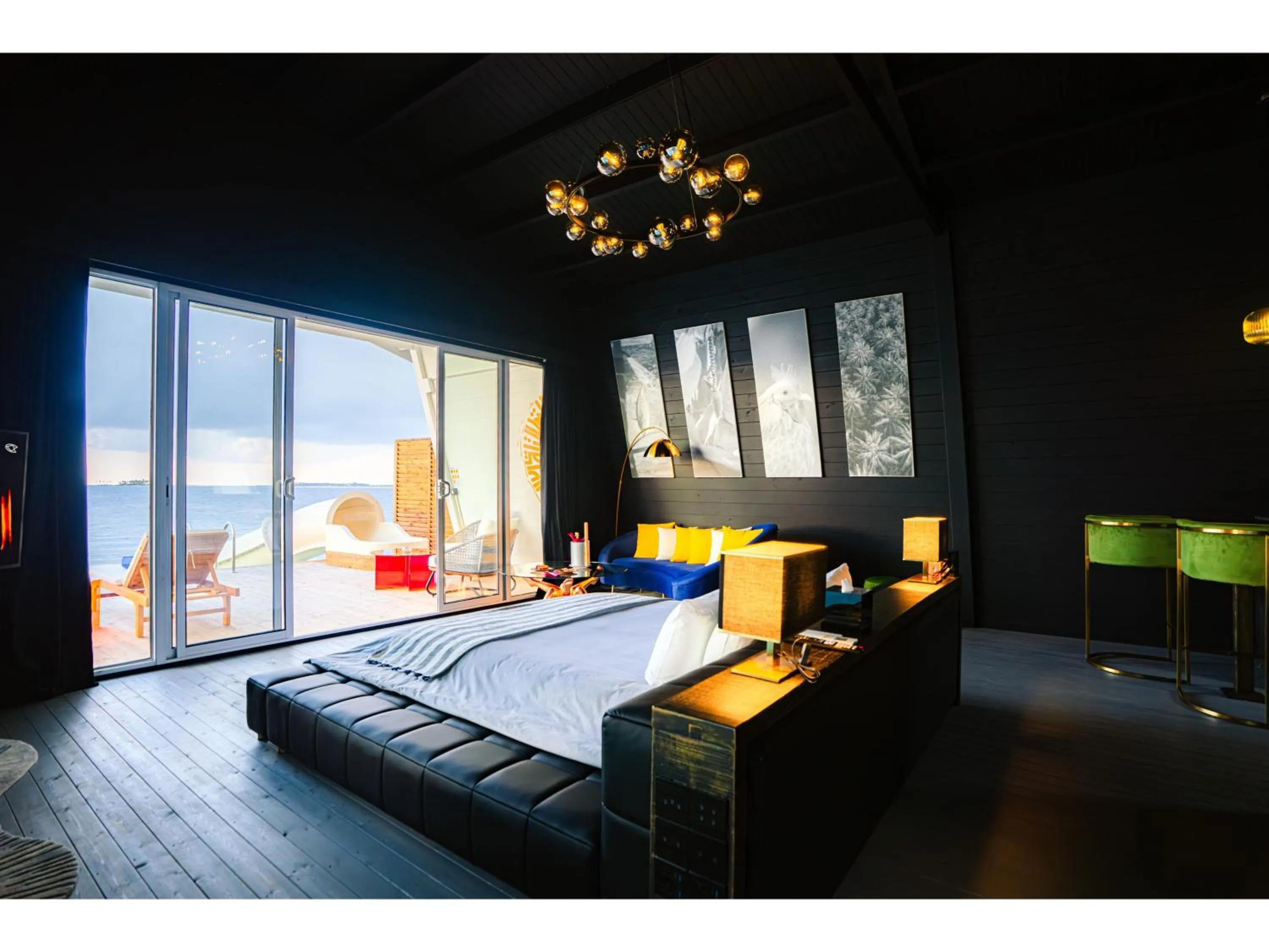 Bed in Oaga Art Resort Maldives - All Inclusive