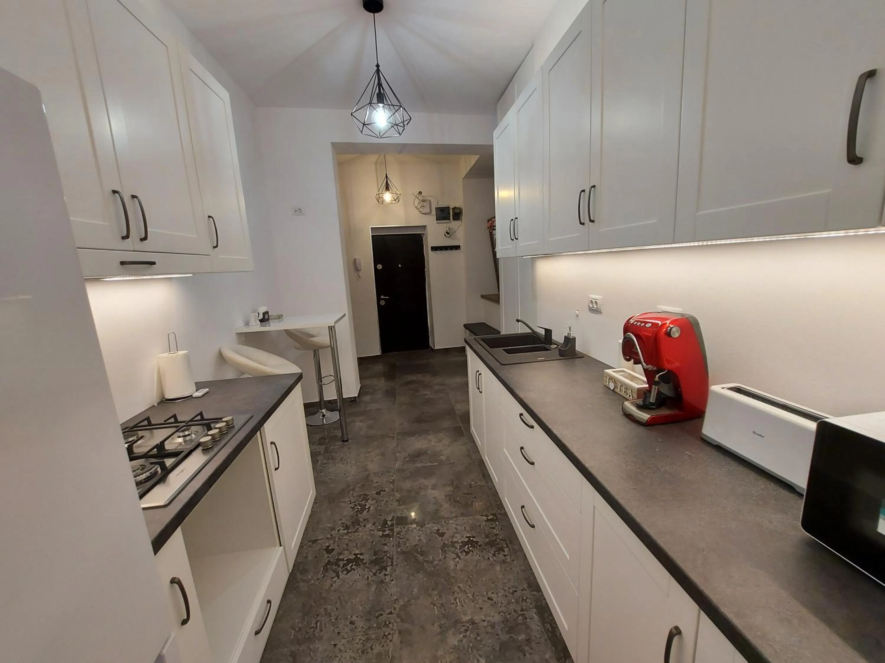 Kitchen or kitchenette in Apartament ultracentral