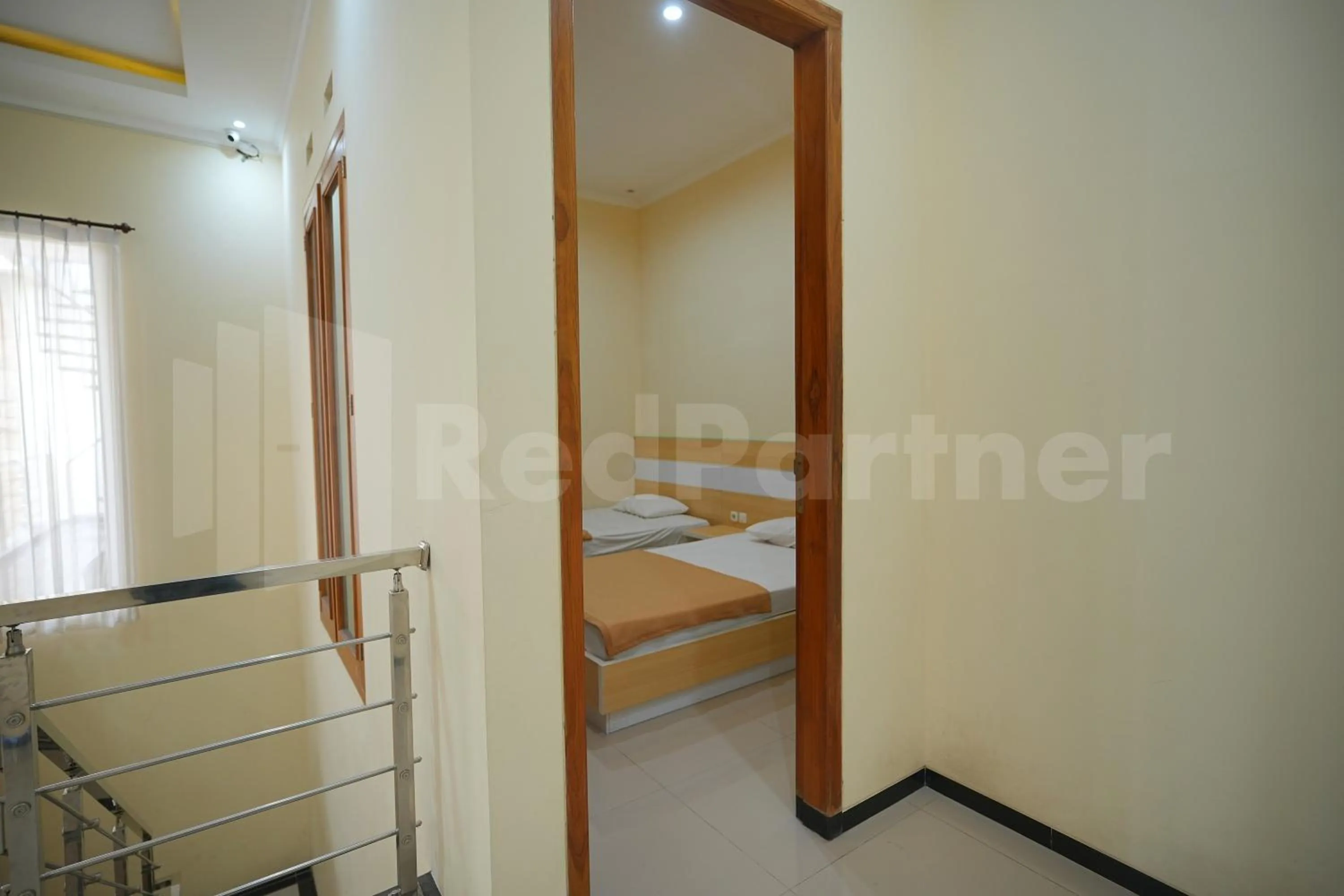 Bedroom, Bed in One & Quin Guest House Syariah Mitra RedDoorz