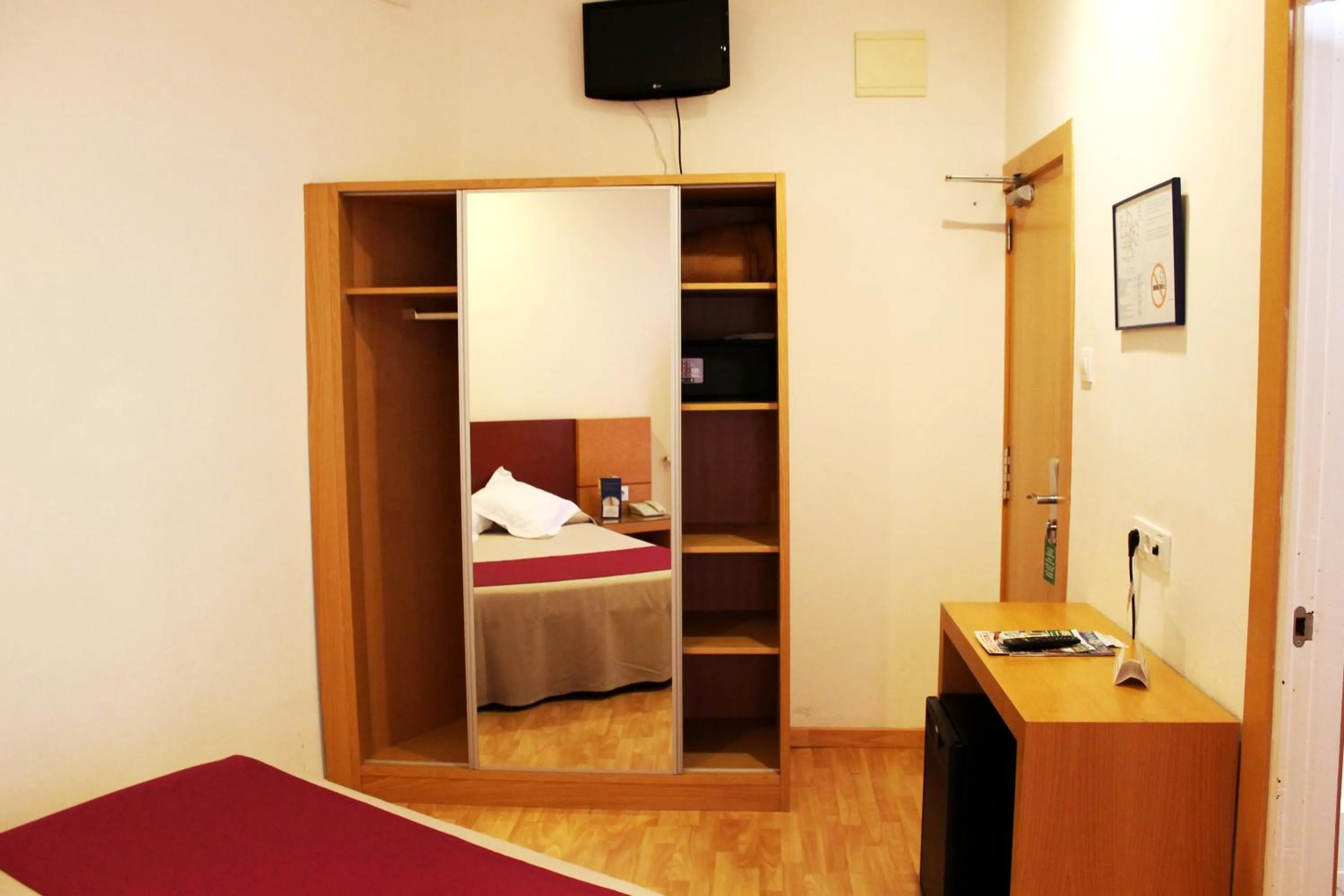 Decorative detail, Bed in Hotel Amic Colon