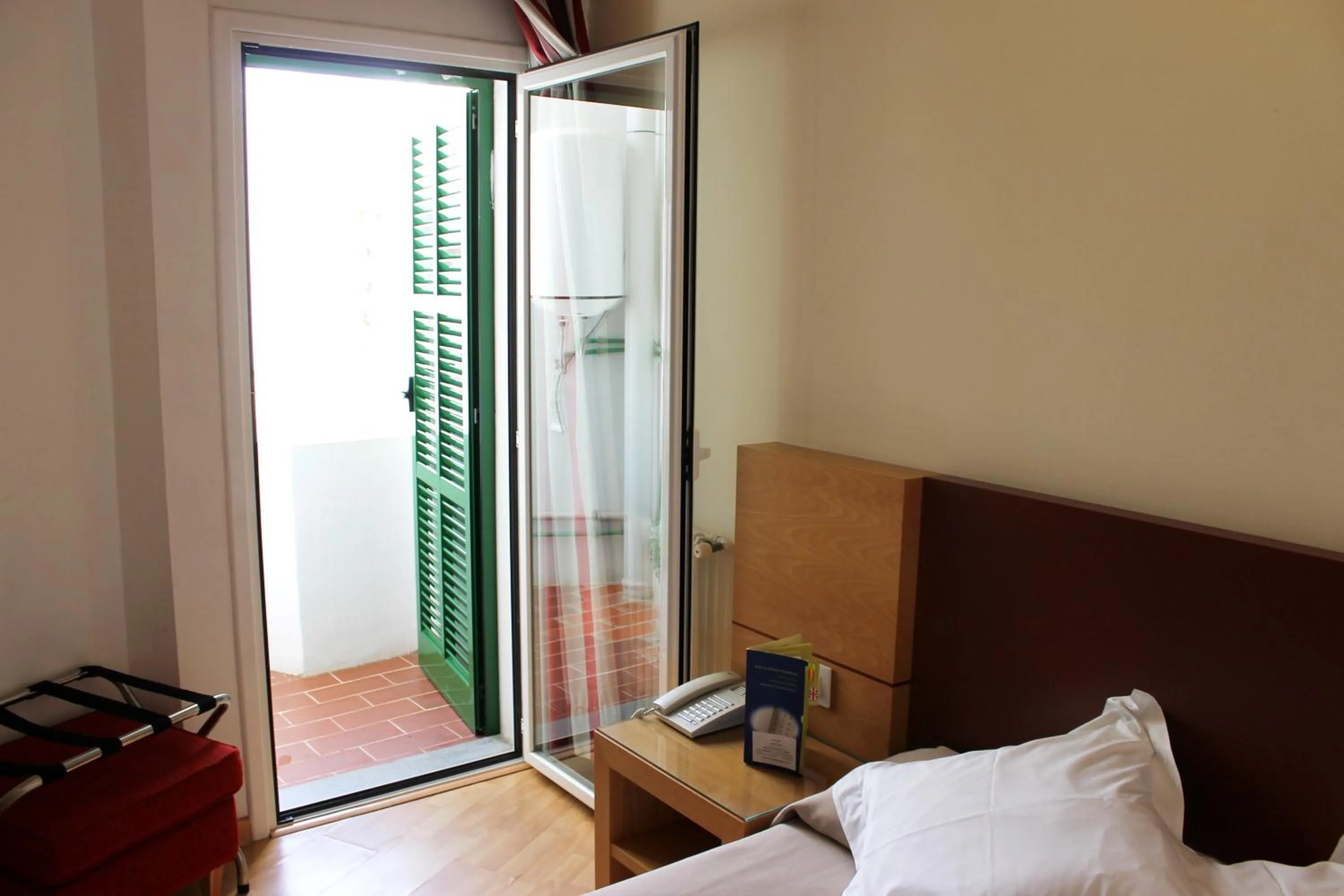 Decorative detail, Bed in Hotel Amic Colon