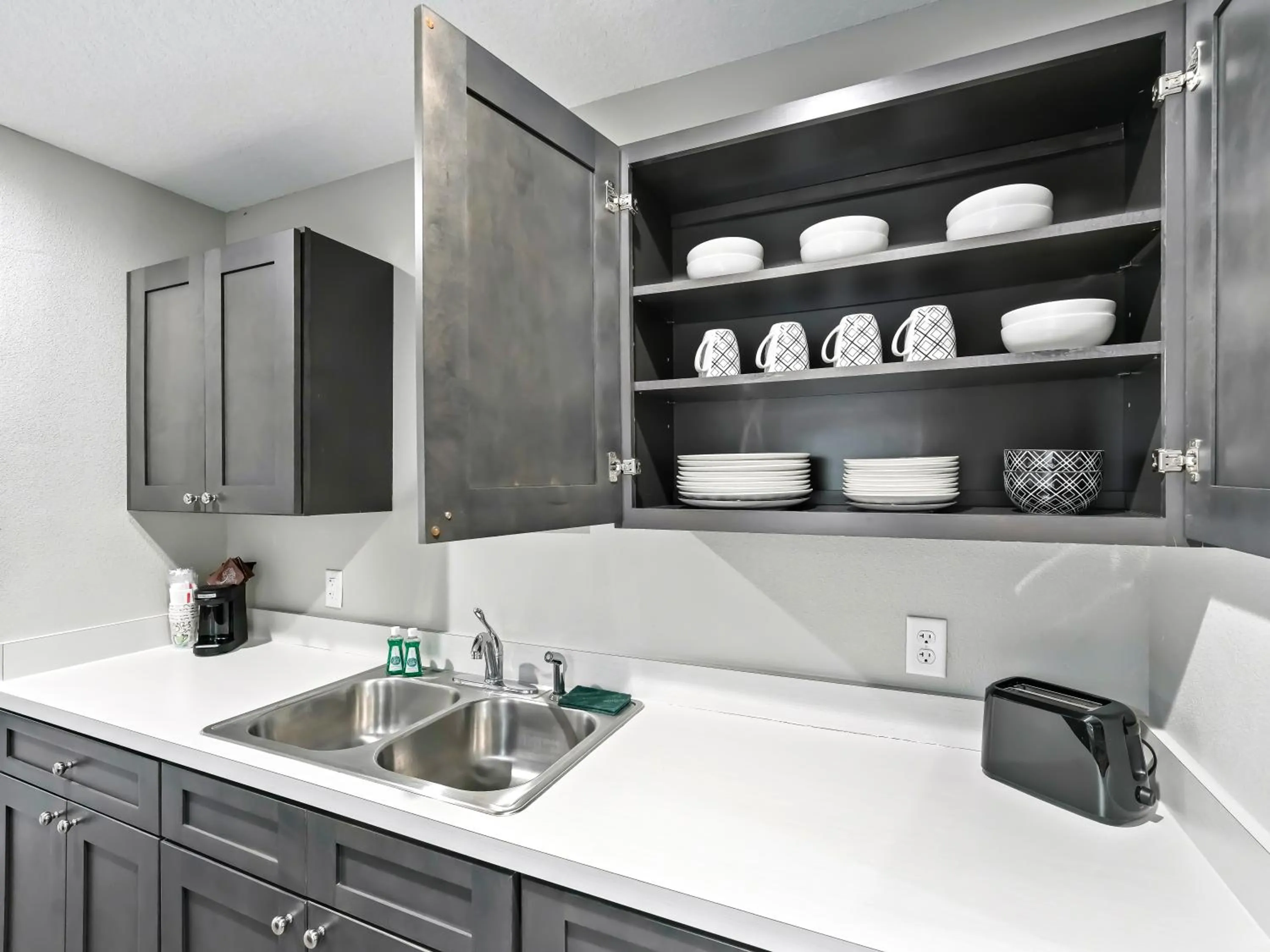 Kitchen or kitchenette in Baymont by Wyndham Ocala Suites