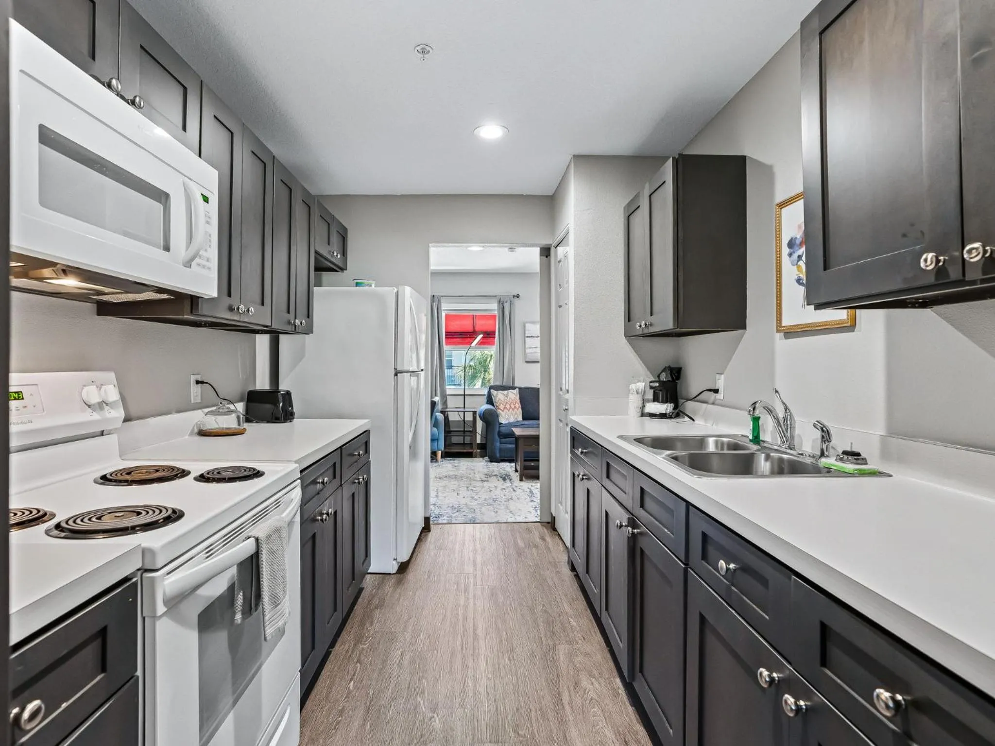 Kitchen or kitchenette in Baymont by Wyndham Ocala Suites