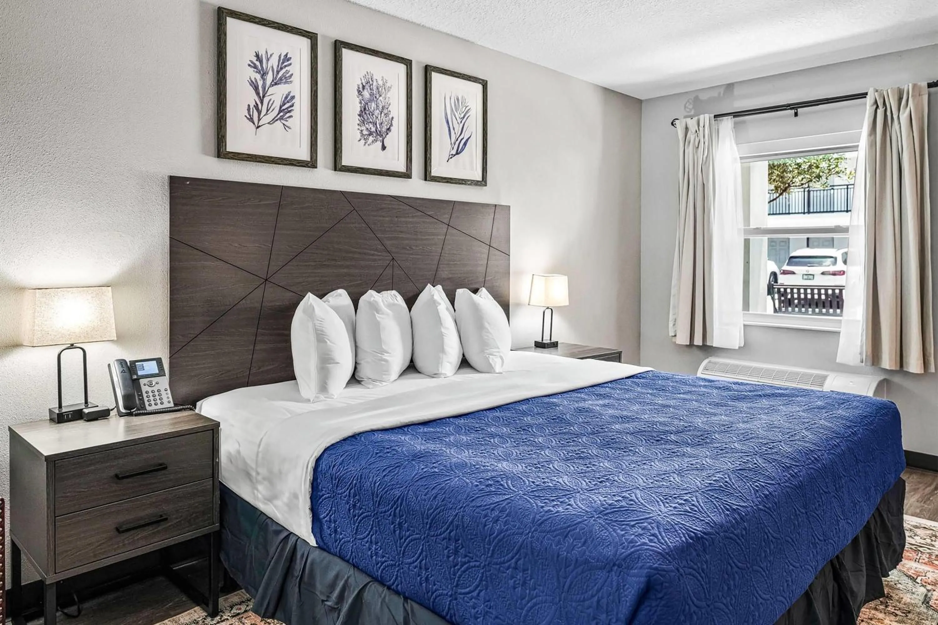 Photo of the whole room, Bed in Baymont by Wyndham Ocala Suites