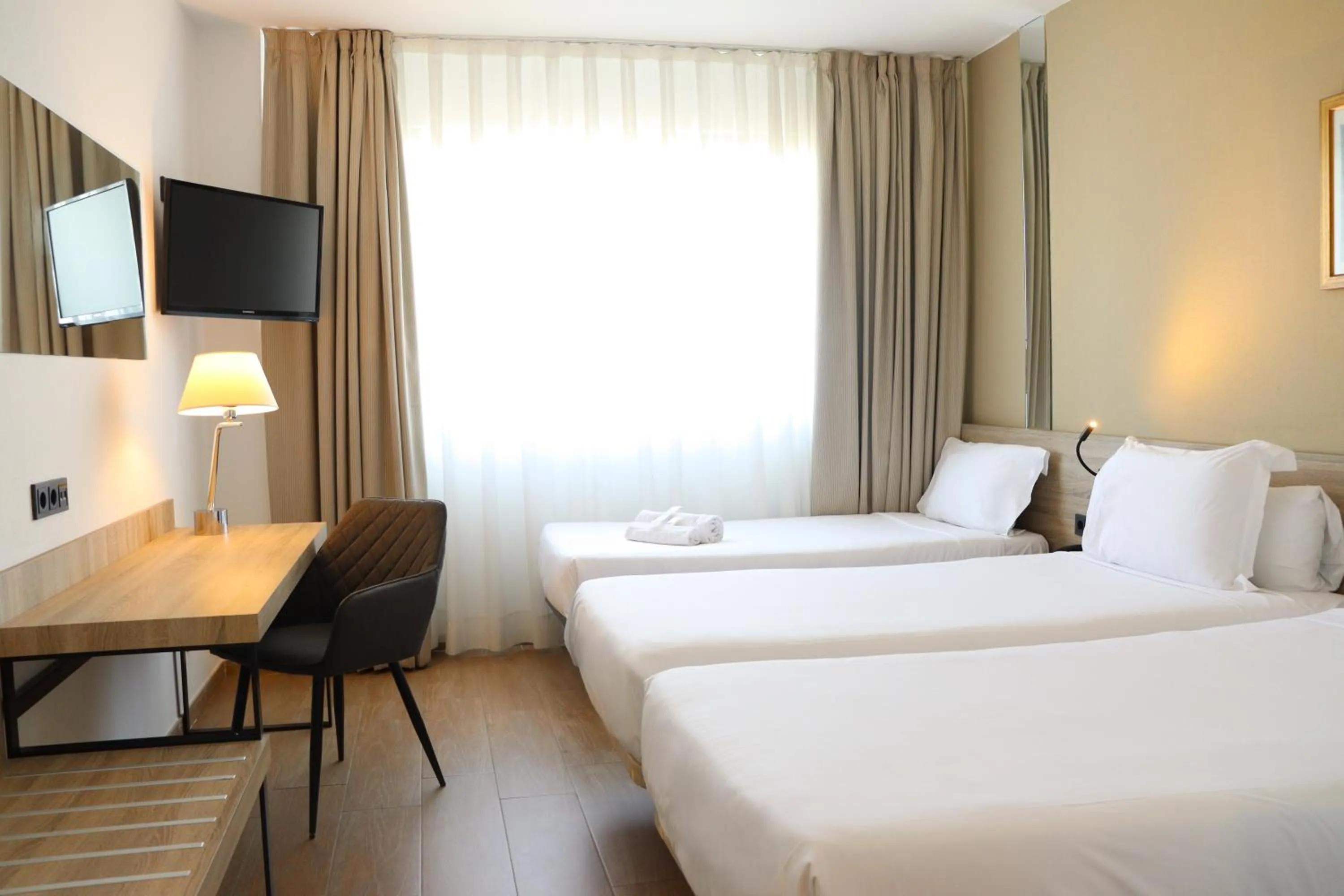 Bed in Eurohotel Diagonal Port