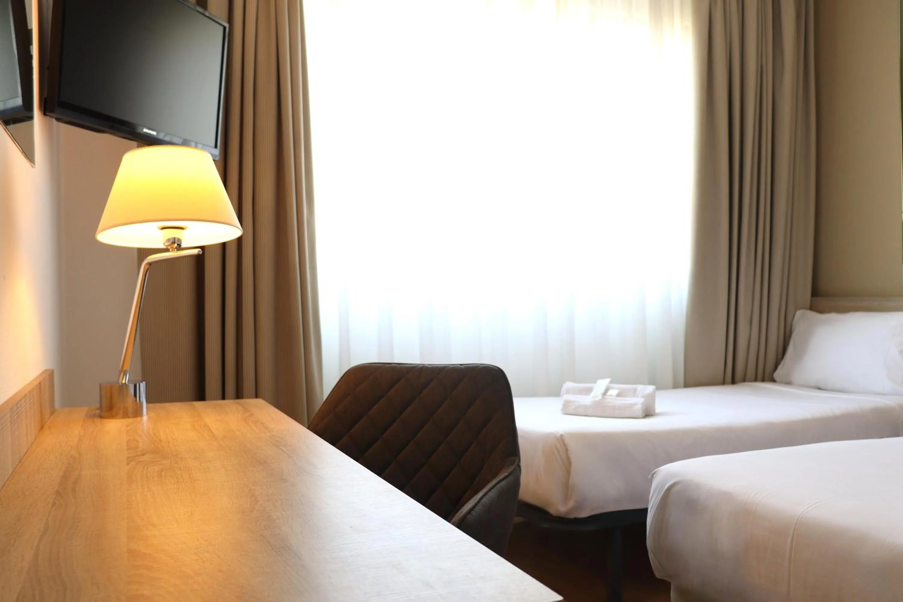 Bed in Eurohotel Diagonal Port