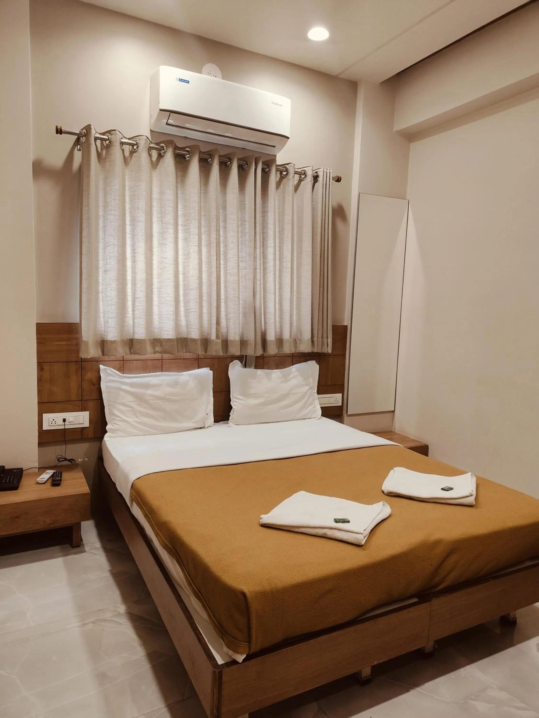 Bed in Hotel TrushaDham Near to Mahalaxmi Temple Kolhapur