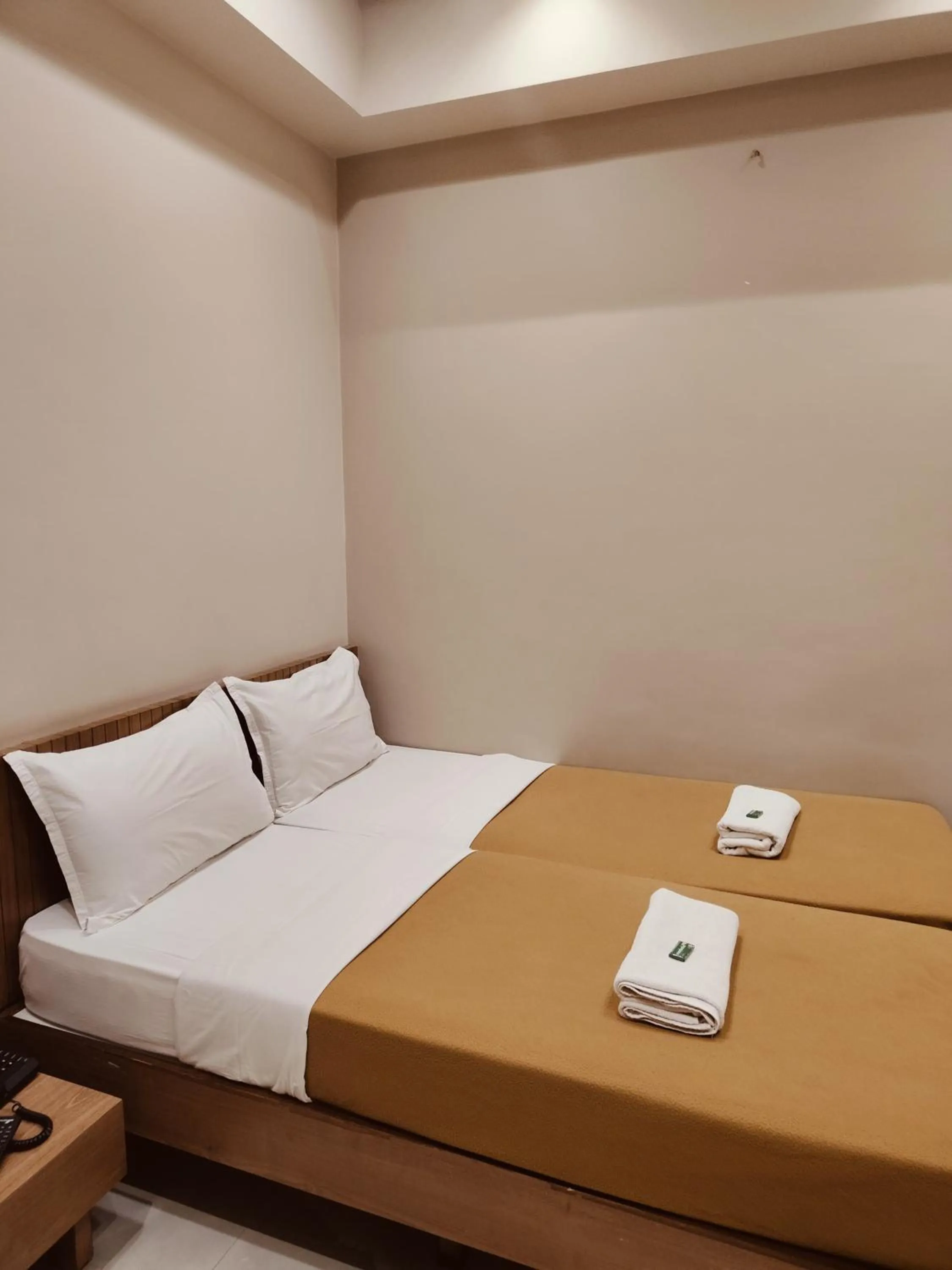 Bed in Hotel TrushaDham Near to Mahalaxmi Temple Kolhapur