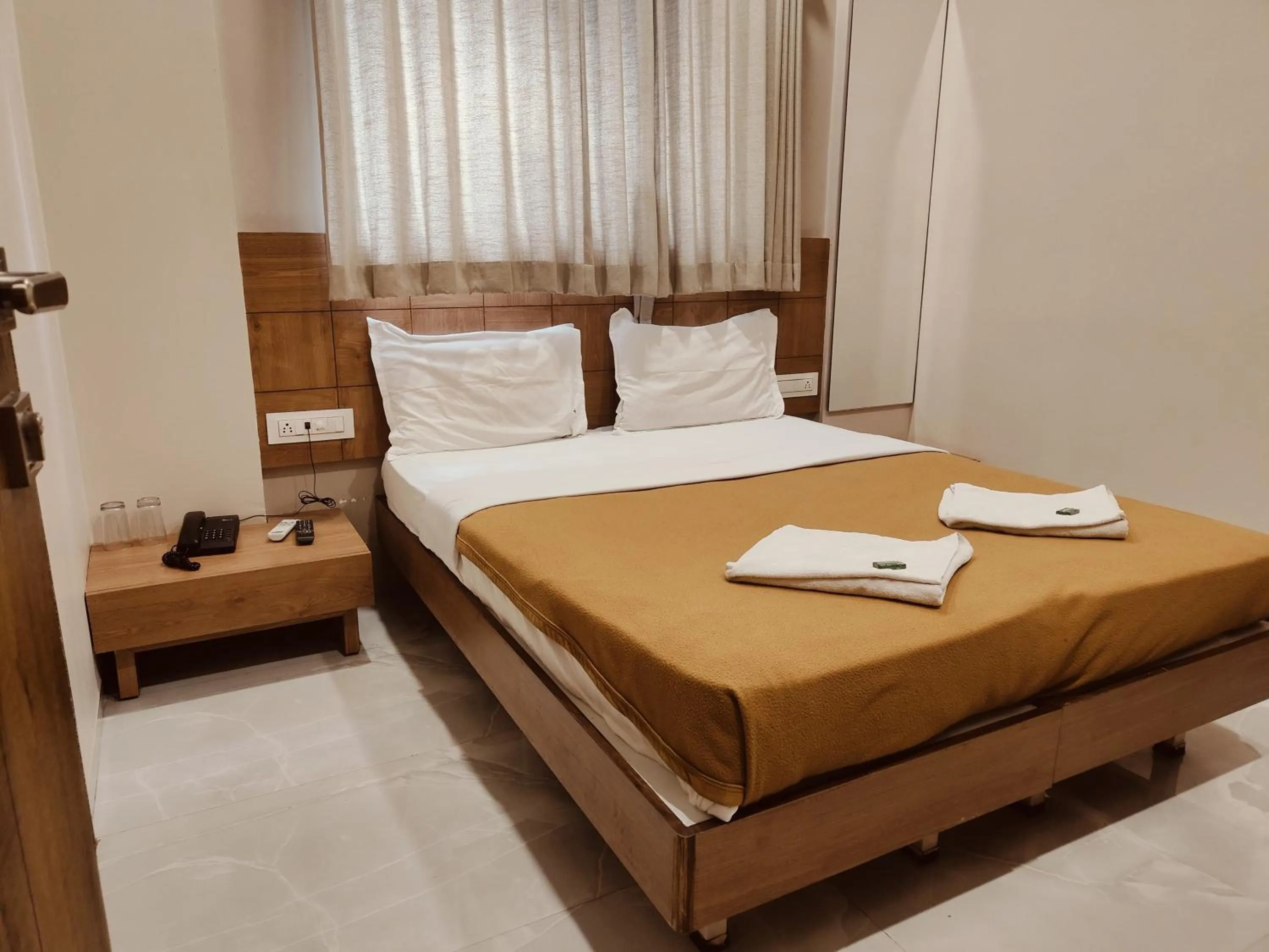 Bed in Hotel TrushaDham Near to Mahalaxmi Temple Kolhapur