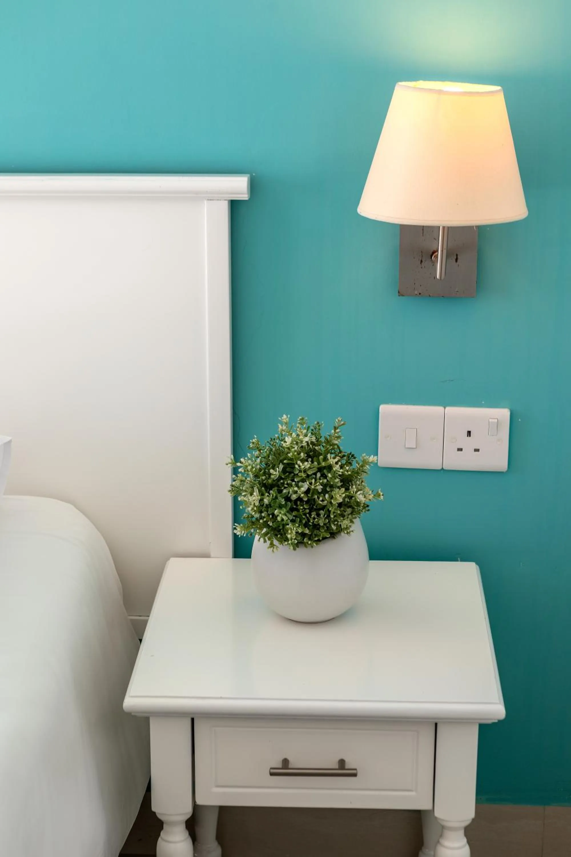 Bed in Mia Hotel Apartment