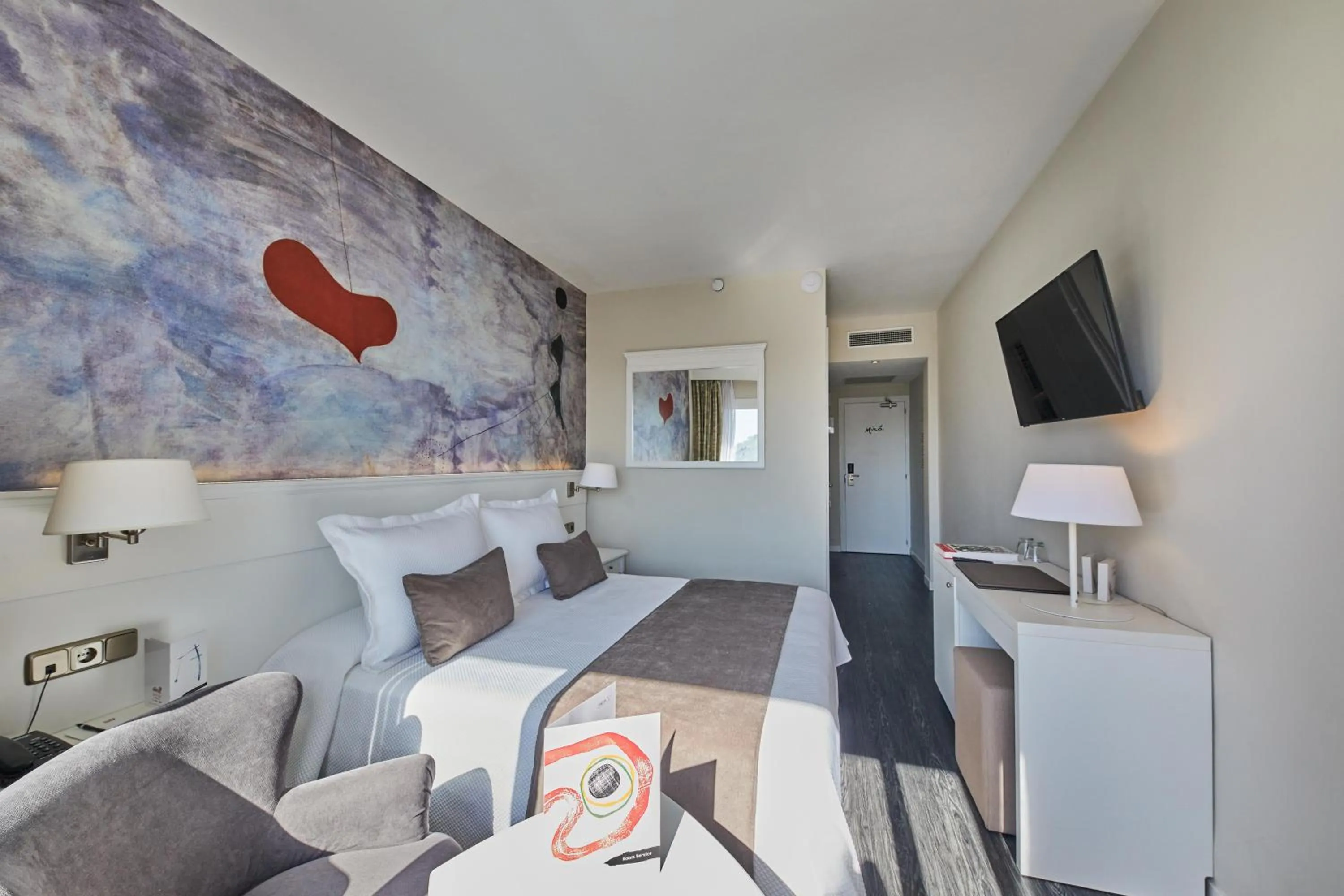 Photo of the whole room, Bed in Hotel Joan Miró Museum