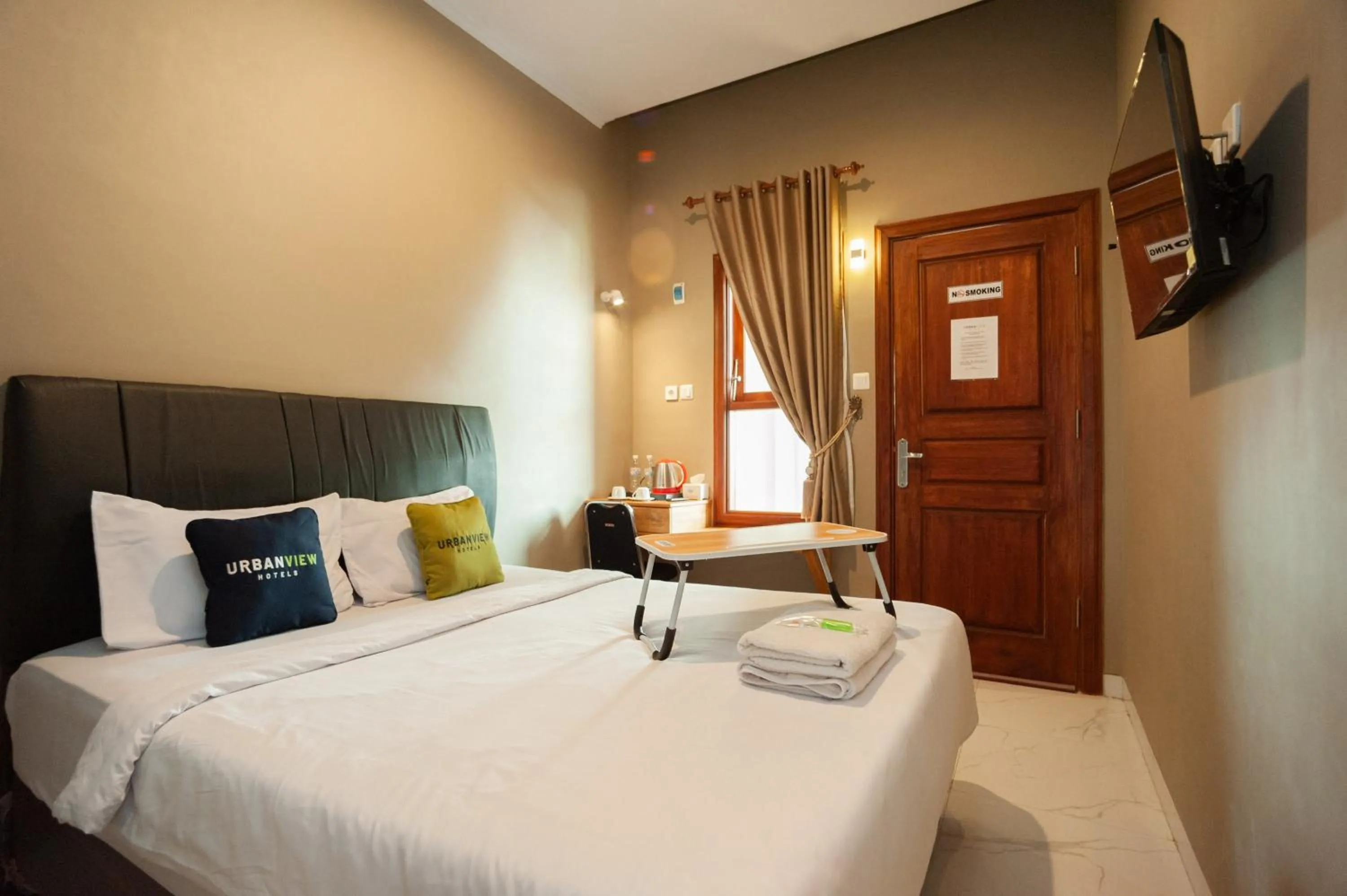 Bedroom, Bed in Urbanview Hotel Bong Gajah Lampung