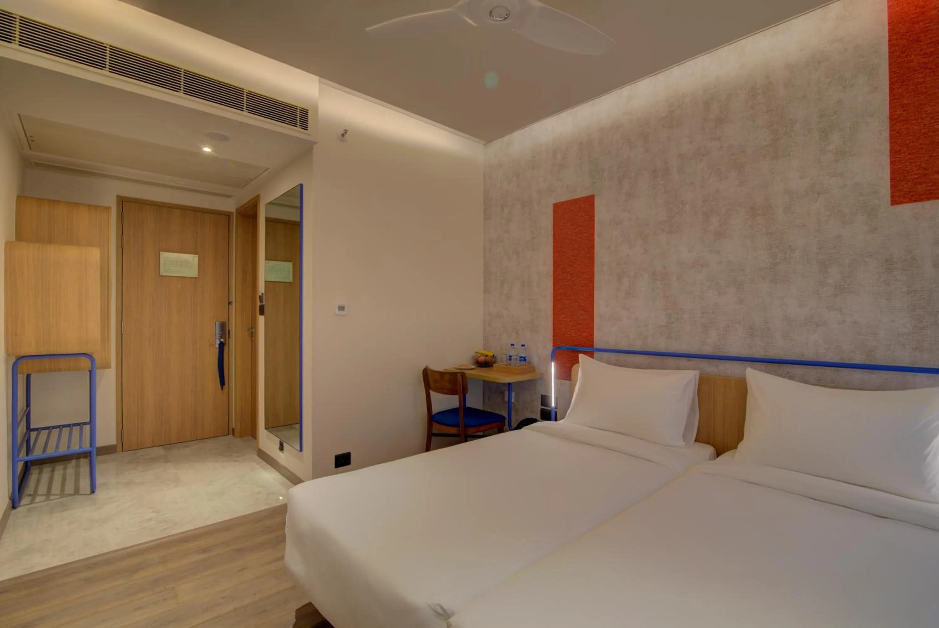 Bed in 7 Apple Hotel Nashik