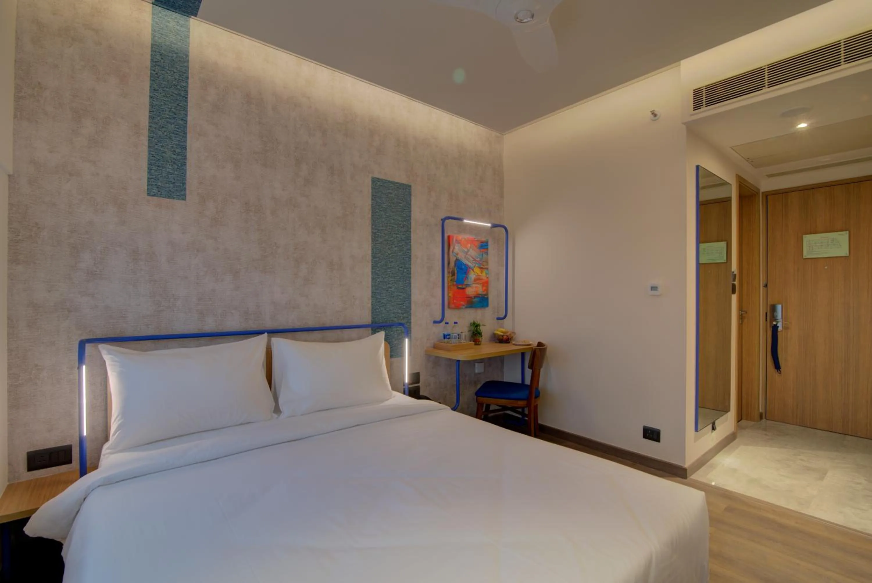 Bed in 7 Apple Hotel Nashik