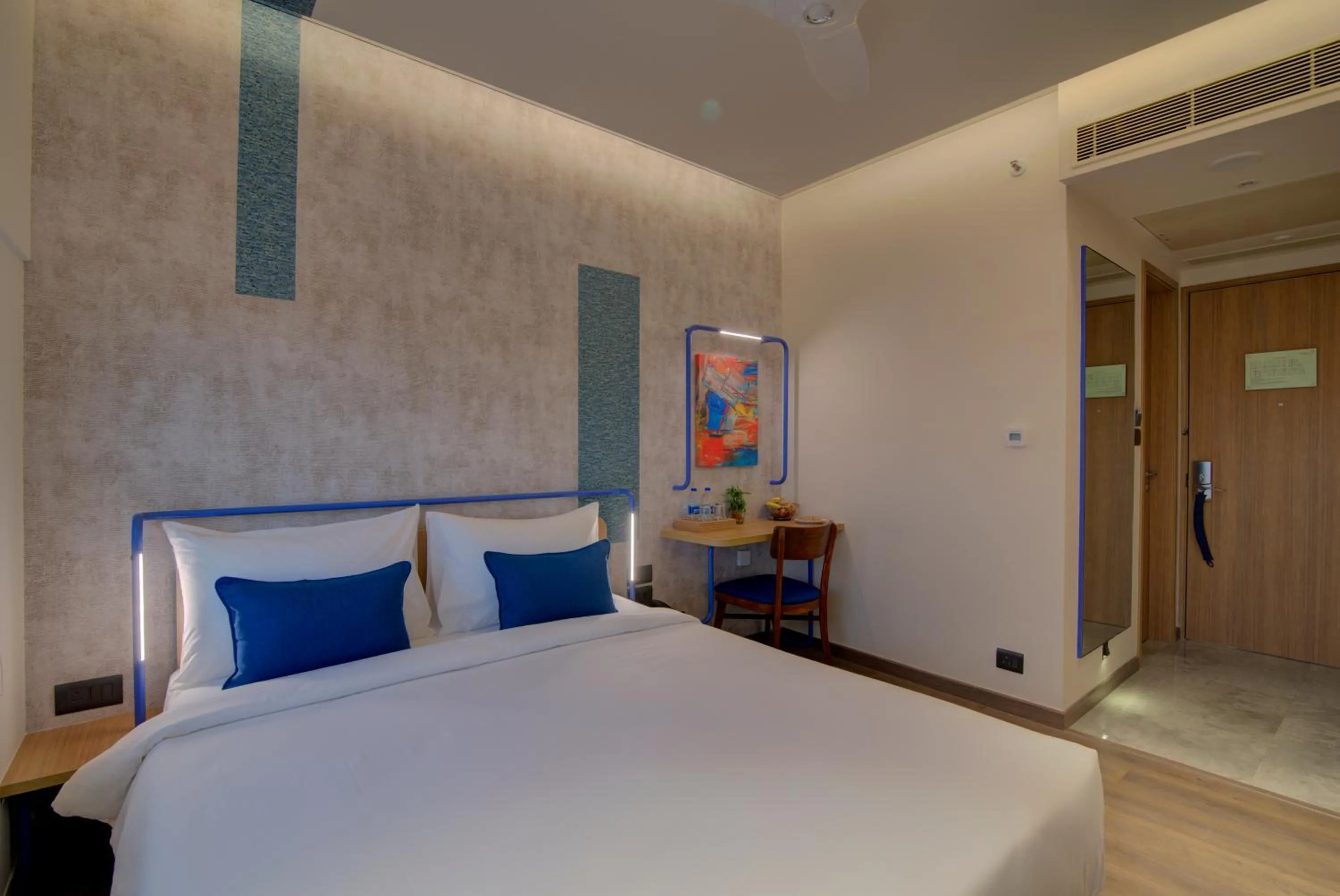 Bed in 7 Apple Hotel Nashik