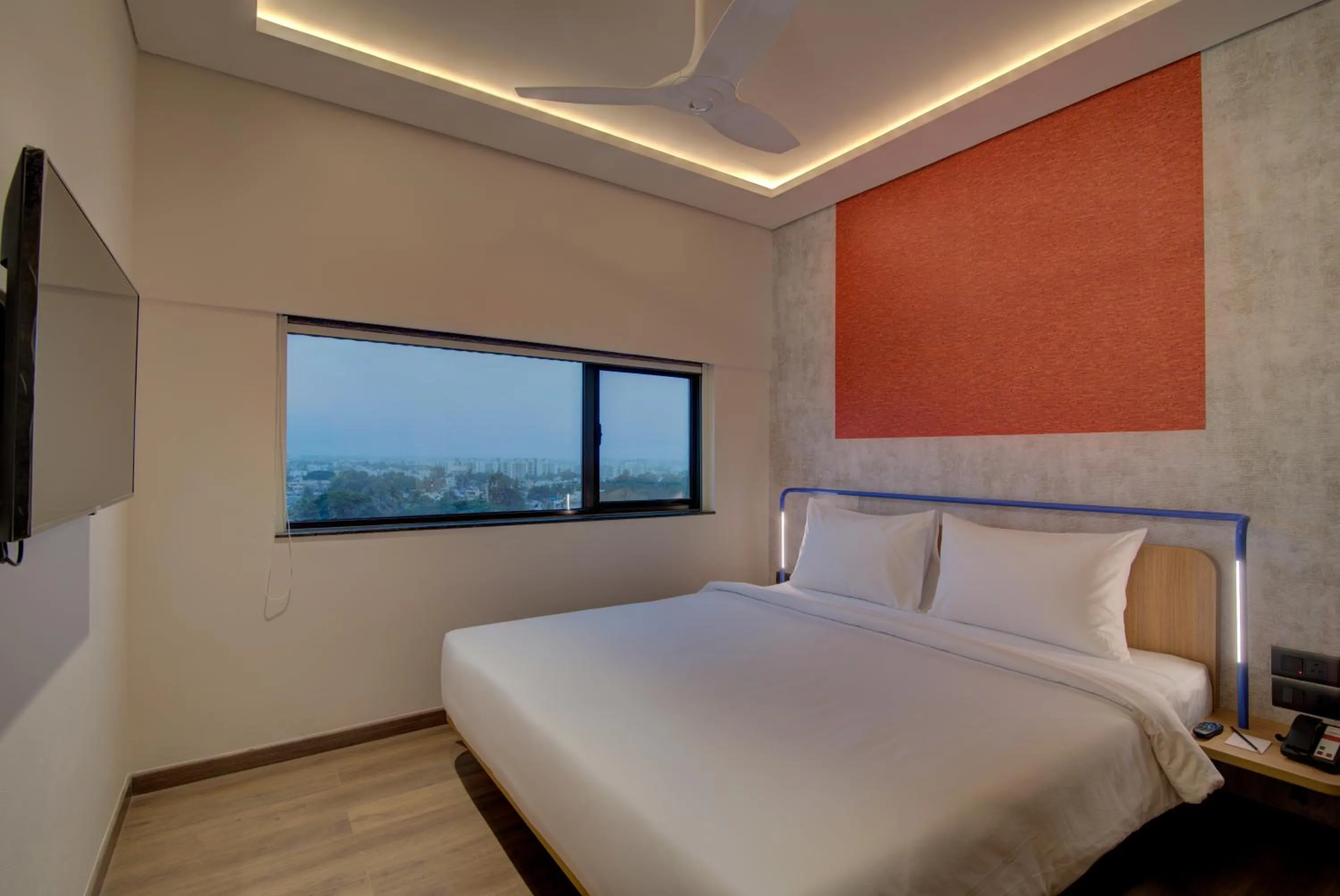 Bed in 7 Apple Hotel Nashik