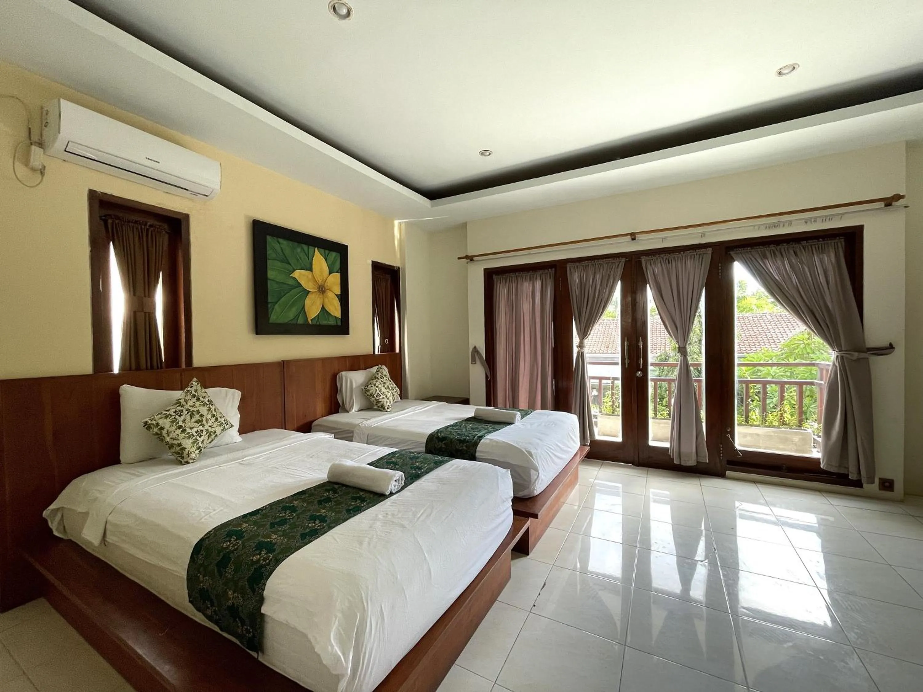 Bed in Melati Resort & Hotel Kuta Lombok