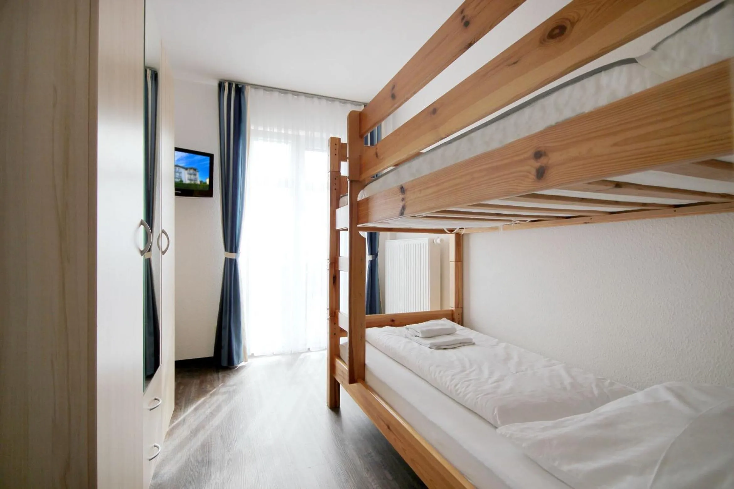 TV and multimedia, Bed in Villa Karina by Rujana