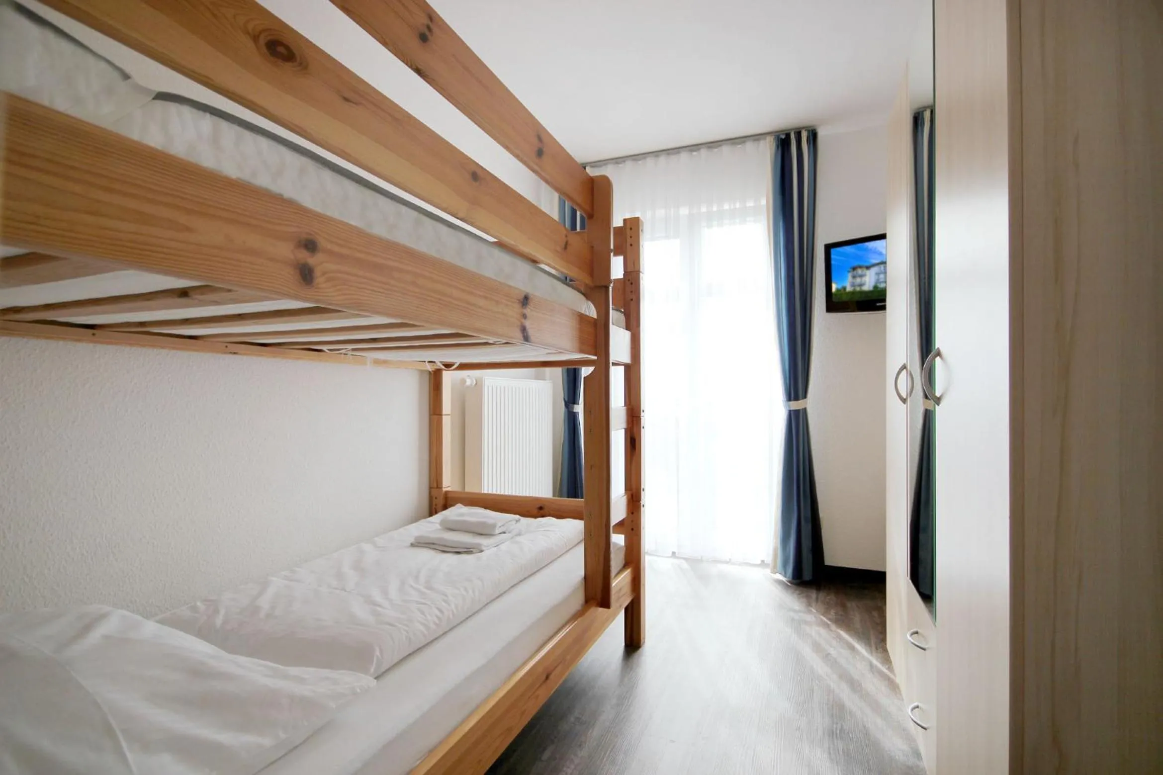 TV and multimedia, Bed in Villa Karina by Rujana