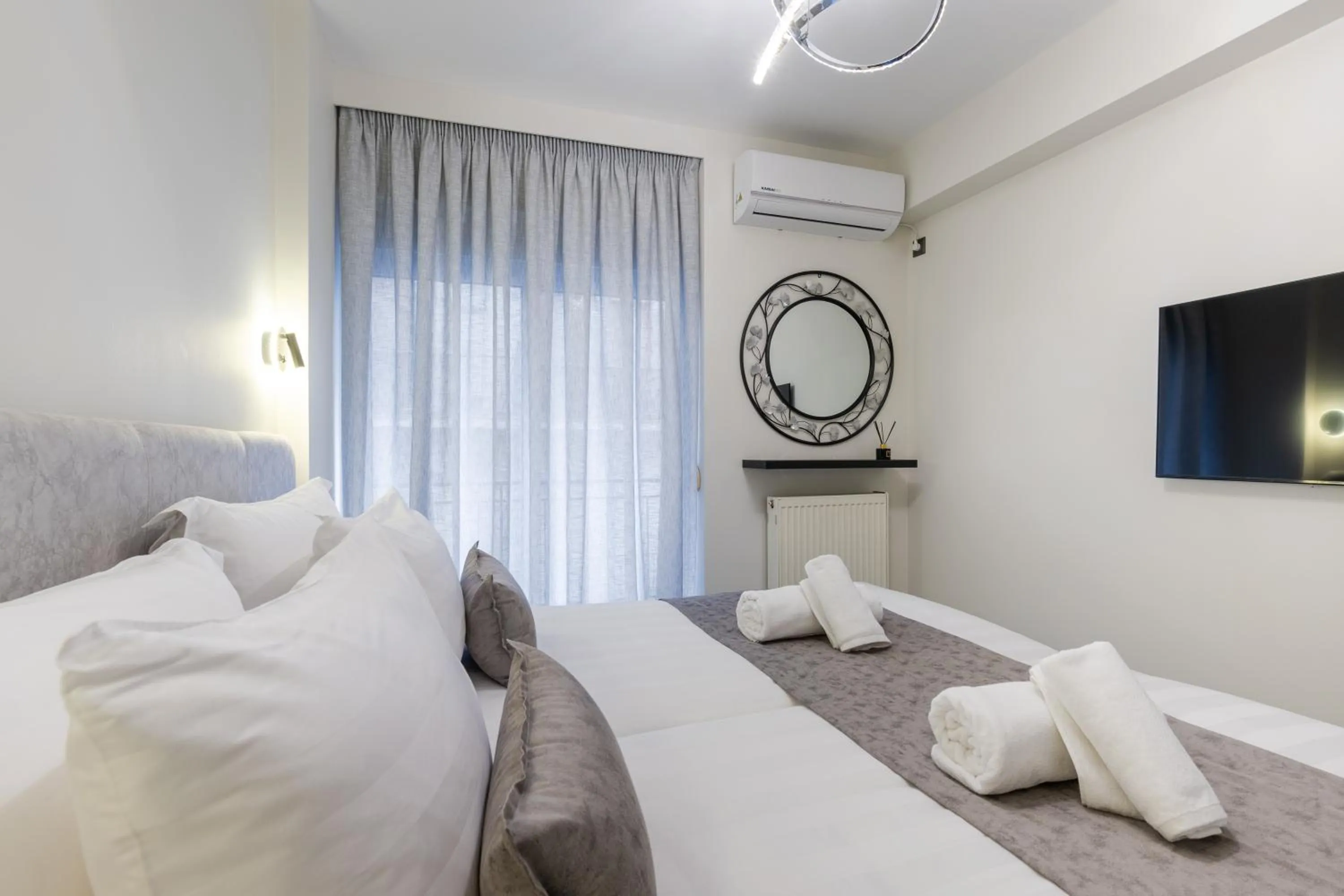 Bed in Acropolis Cozy Apartments